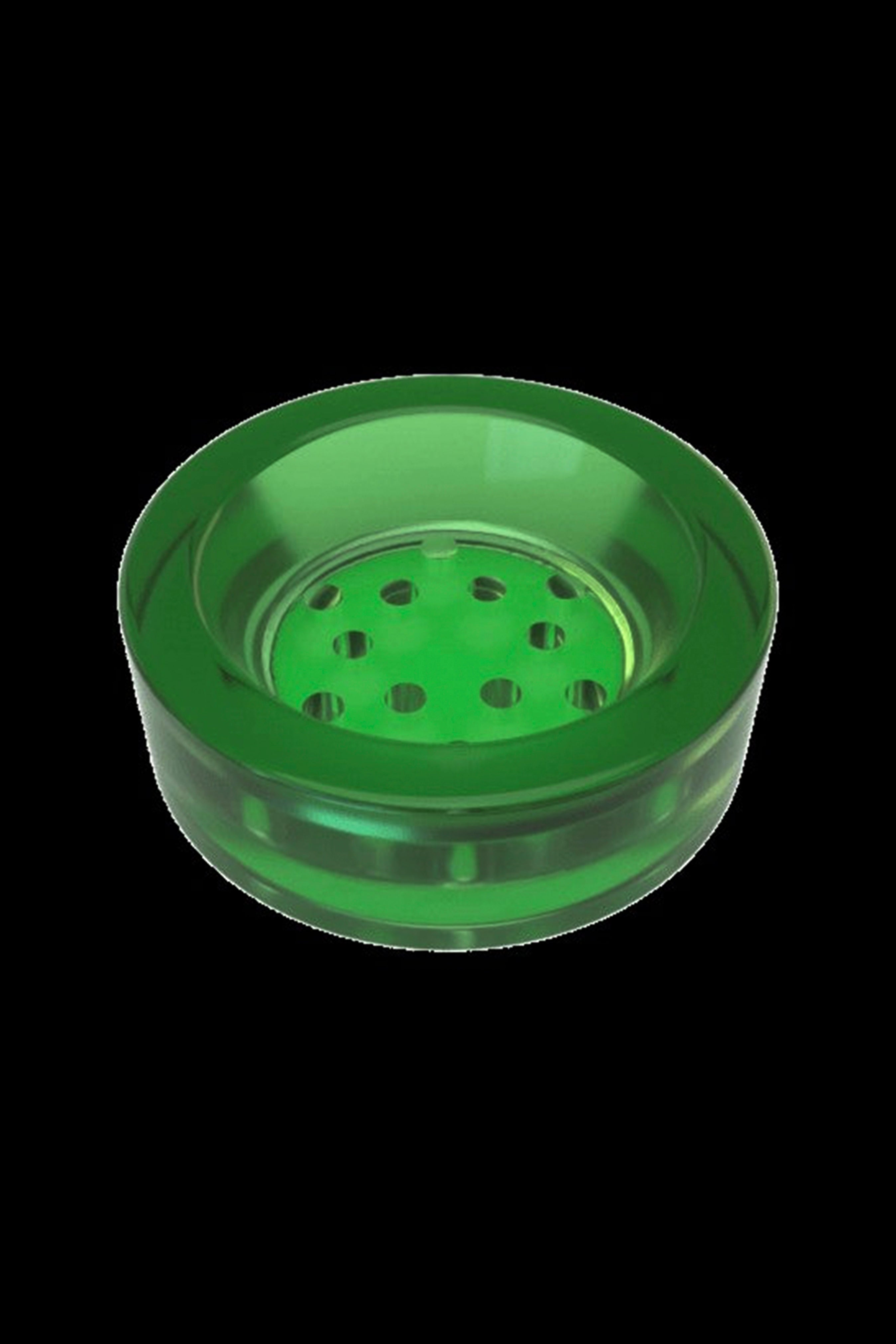 Green glass cannabis bowl with multiple holes.