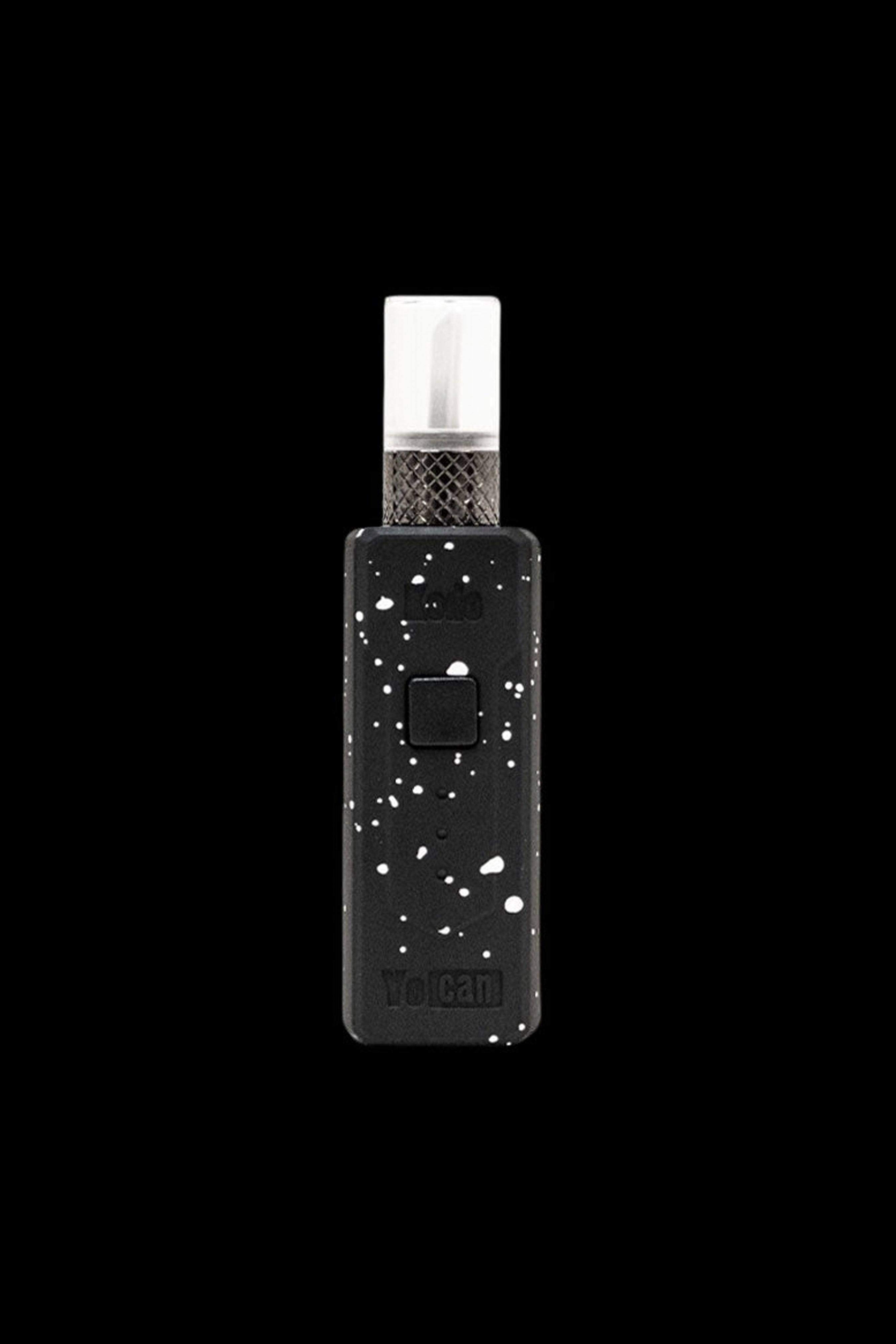 Black and white speckled cannabis oil vape pen with glass cartridge.