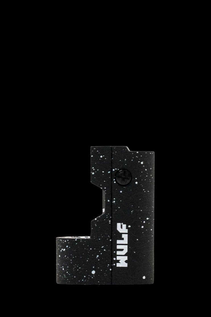 Black and white speckled cannabis concentrate container with “WULF” vertically printed on the side.