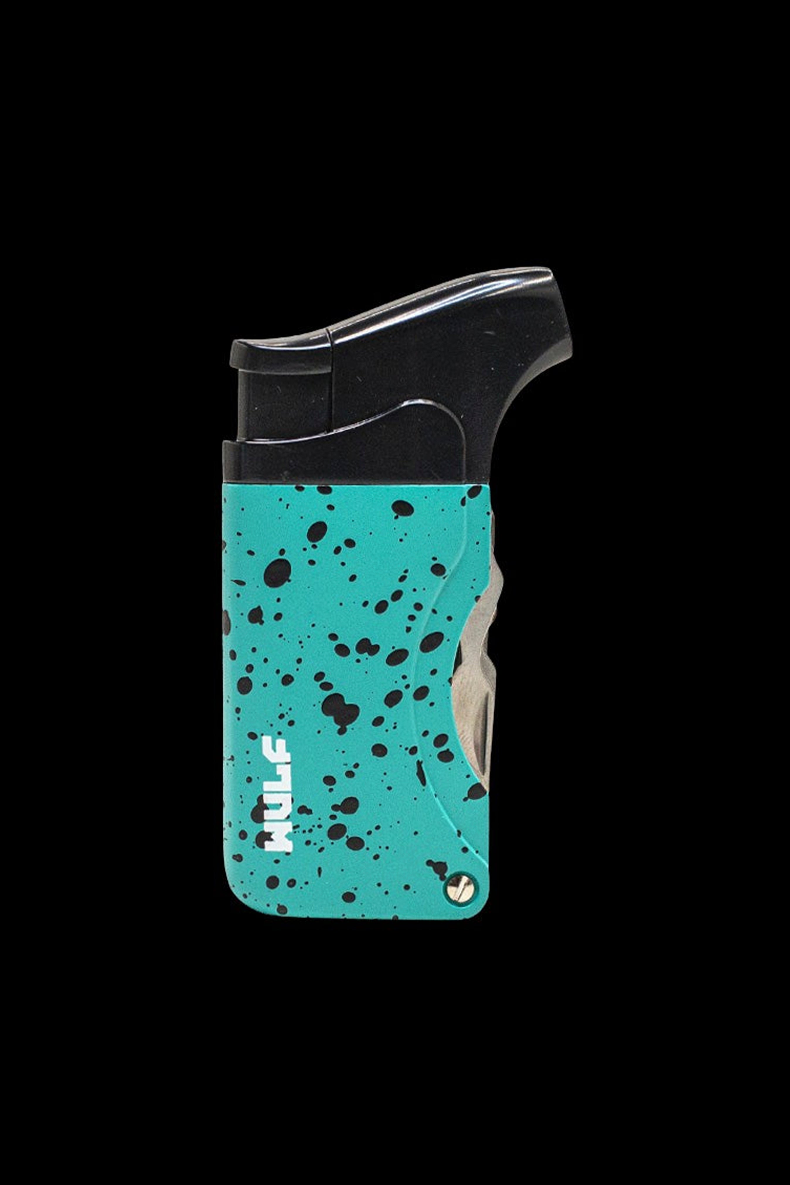 Turquoise torch lighter with black splatter pattern and “HULP” logo, isolated on a black background.