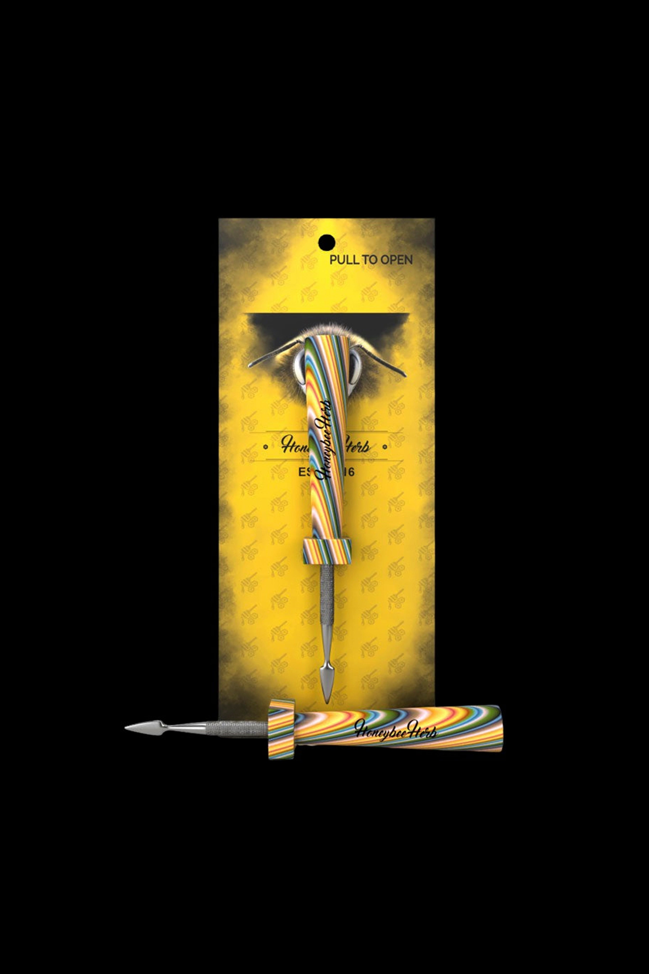 Yellow and black cannabis dab applicator pen in packaging with a bee design.
