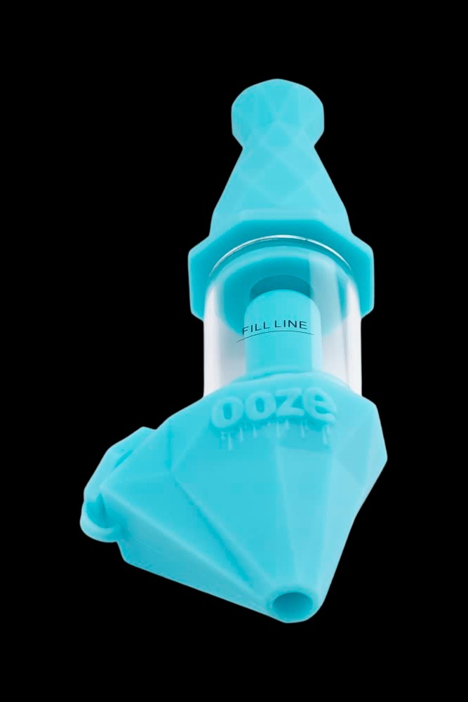 Blue silicone oil rig carb cap with "DOZE" branding.
