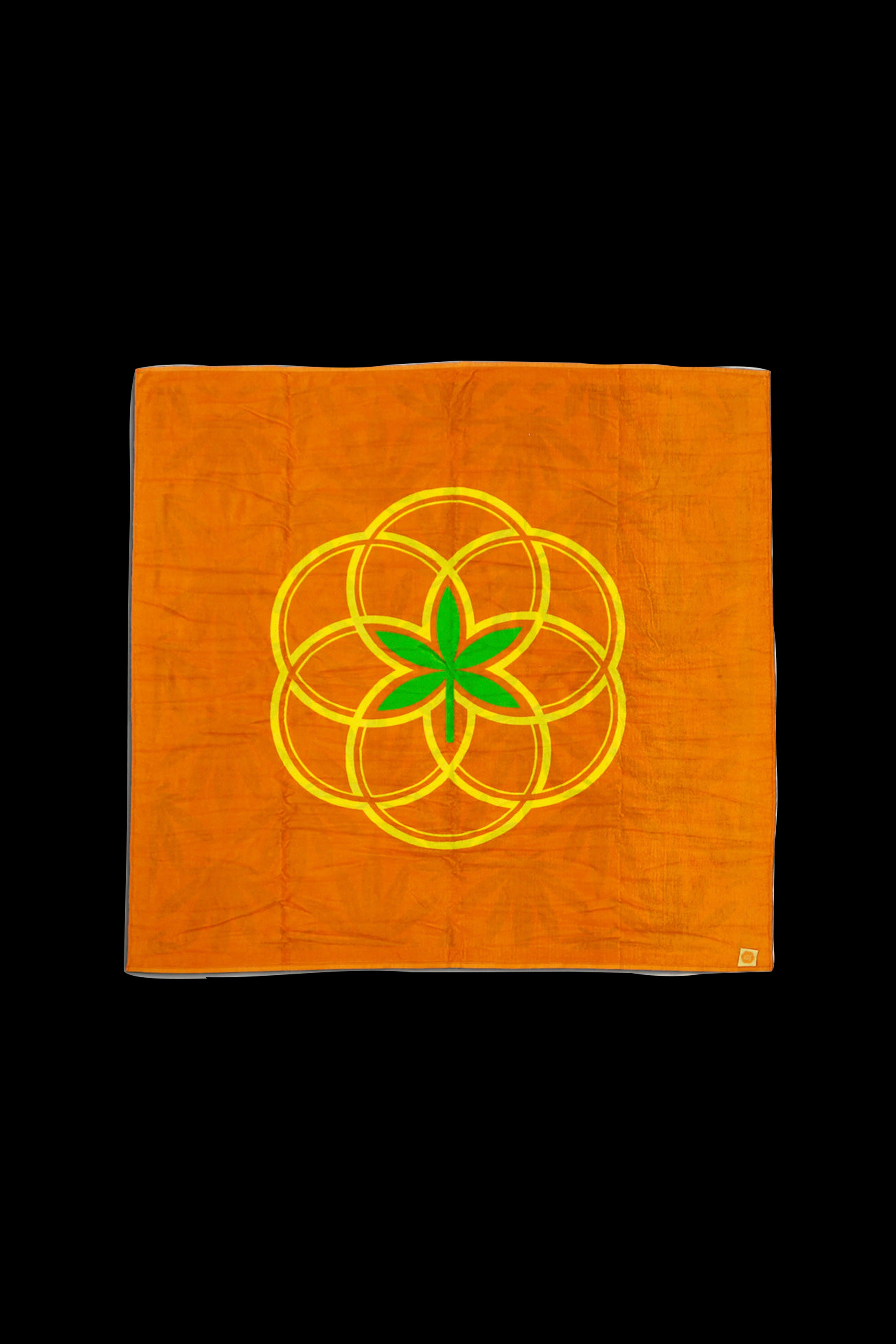 Orange bandana with a stylized, golden cannabis leaf and floral pattern.