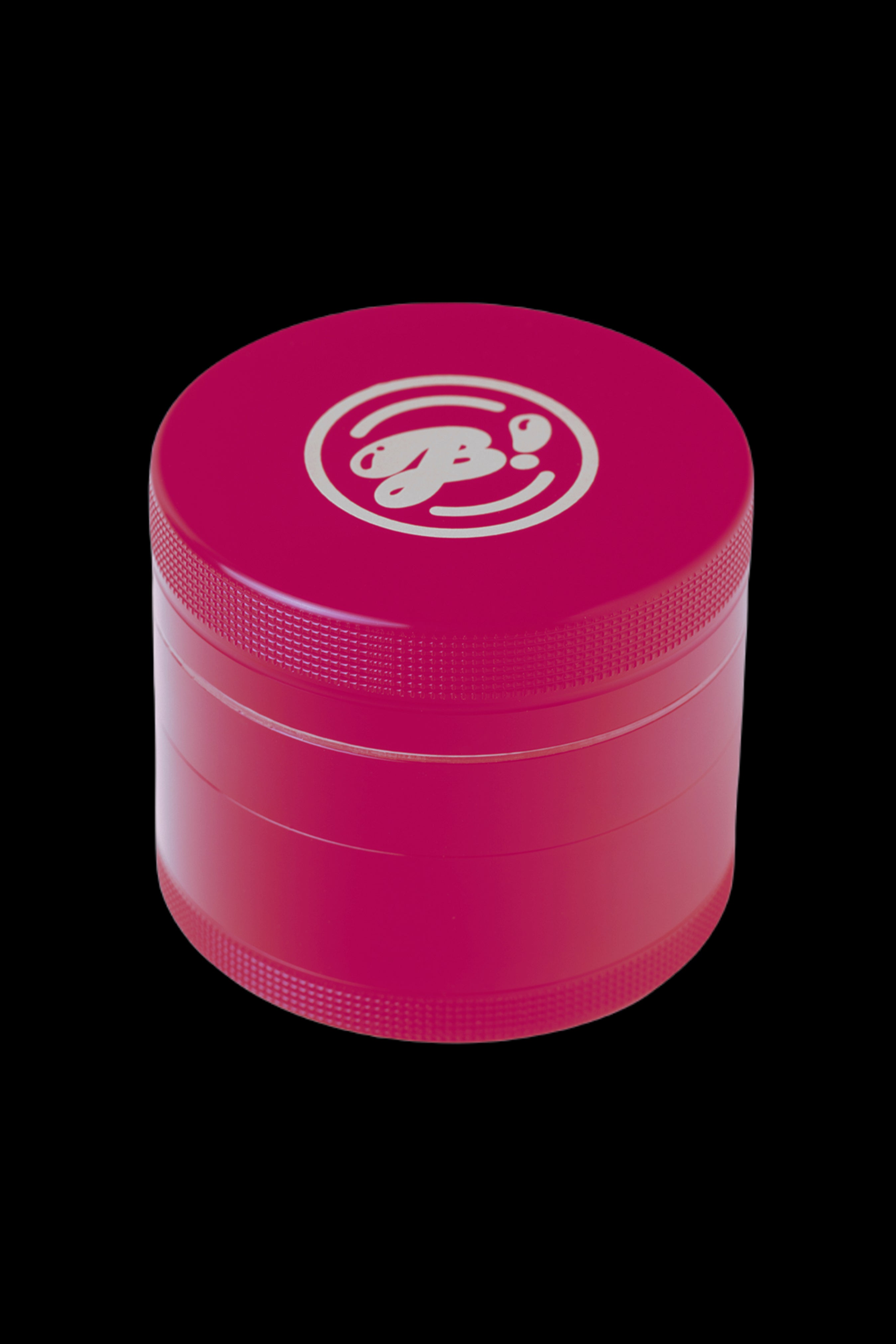 Pink four-piece cannabis grinder with a logo.