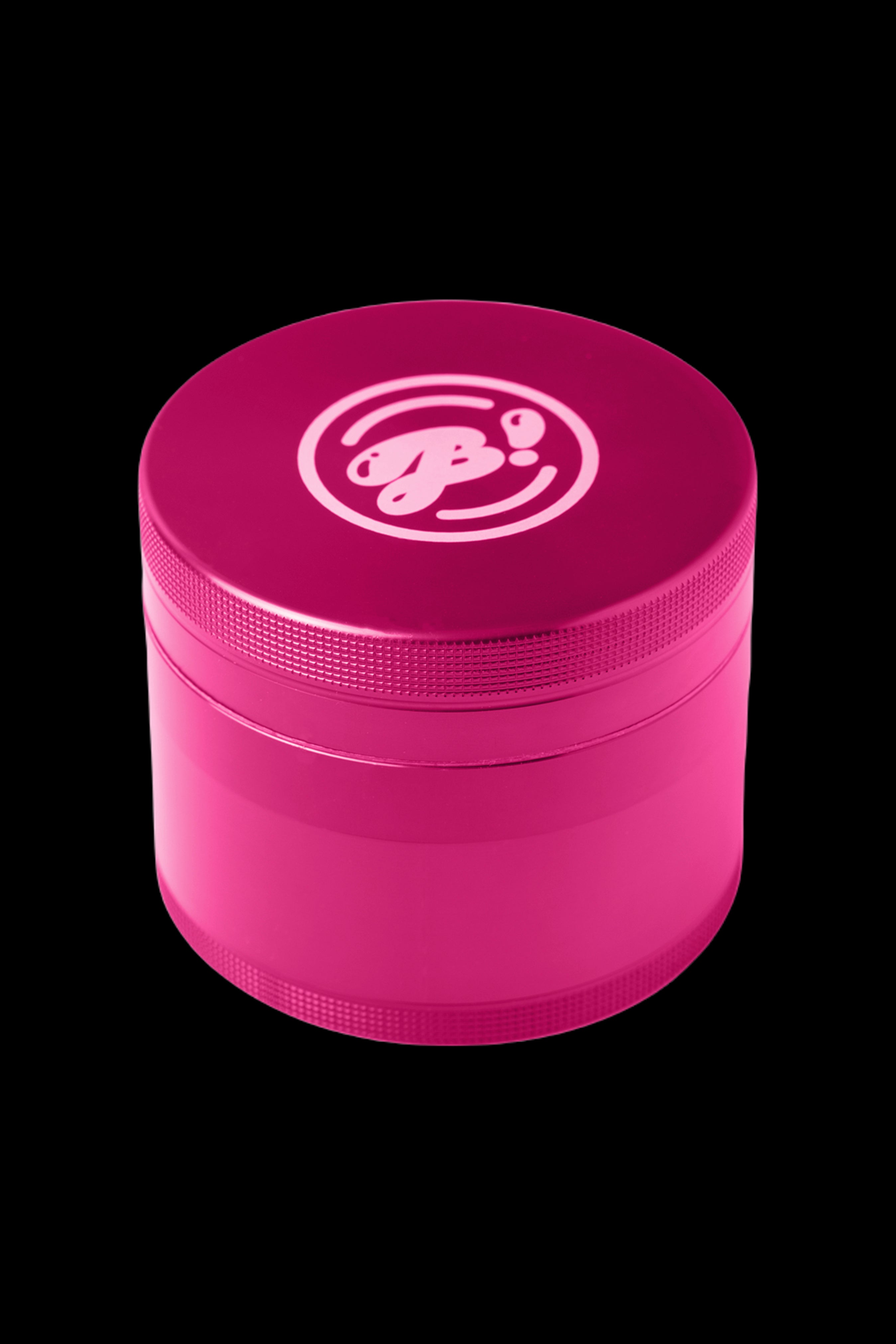 Pink four-piece cannabis grinder with a white logo.