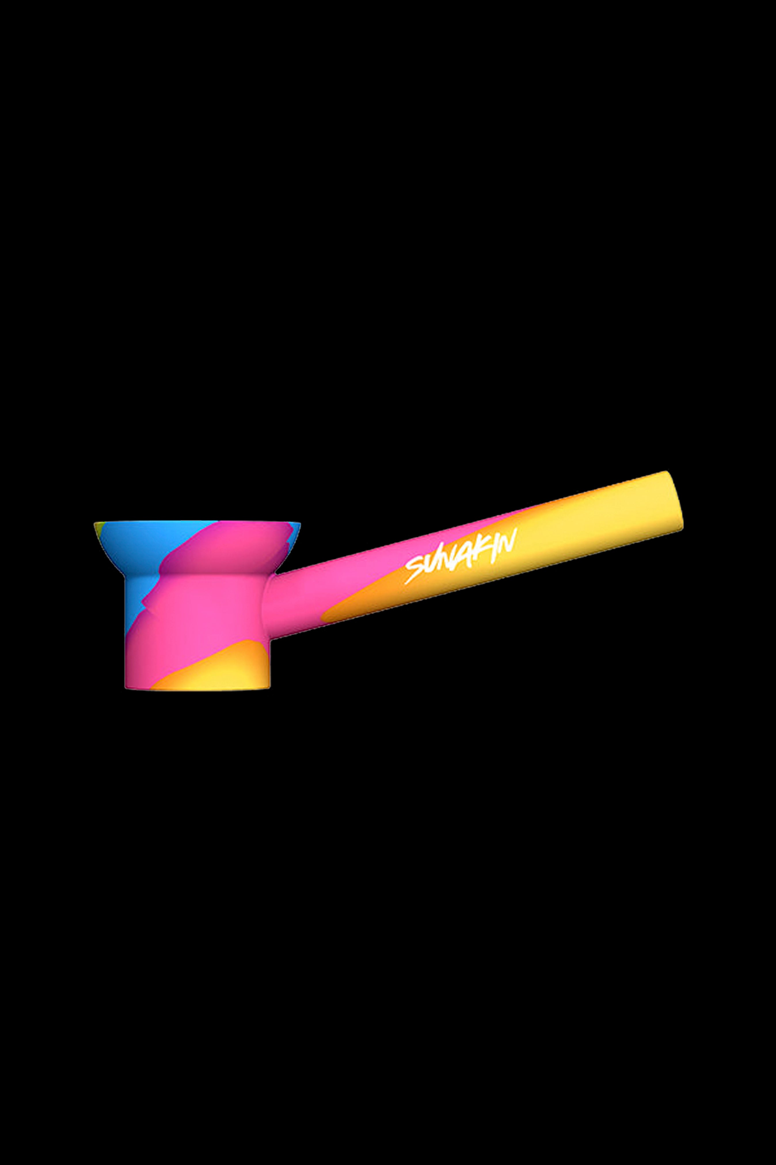 Colorful glass pipe with “Sunakin” text on the stem, isolated on a black background.