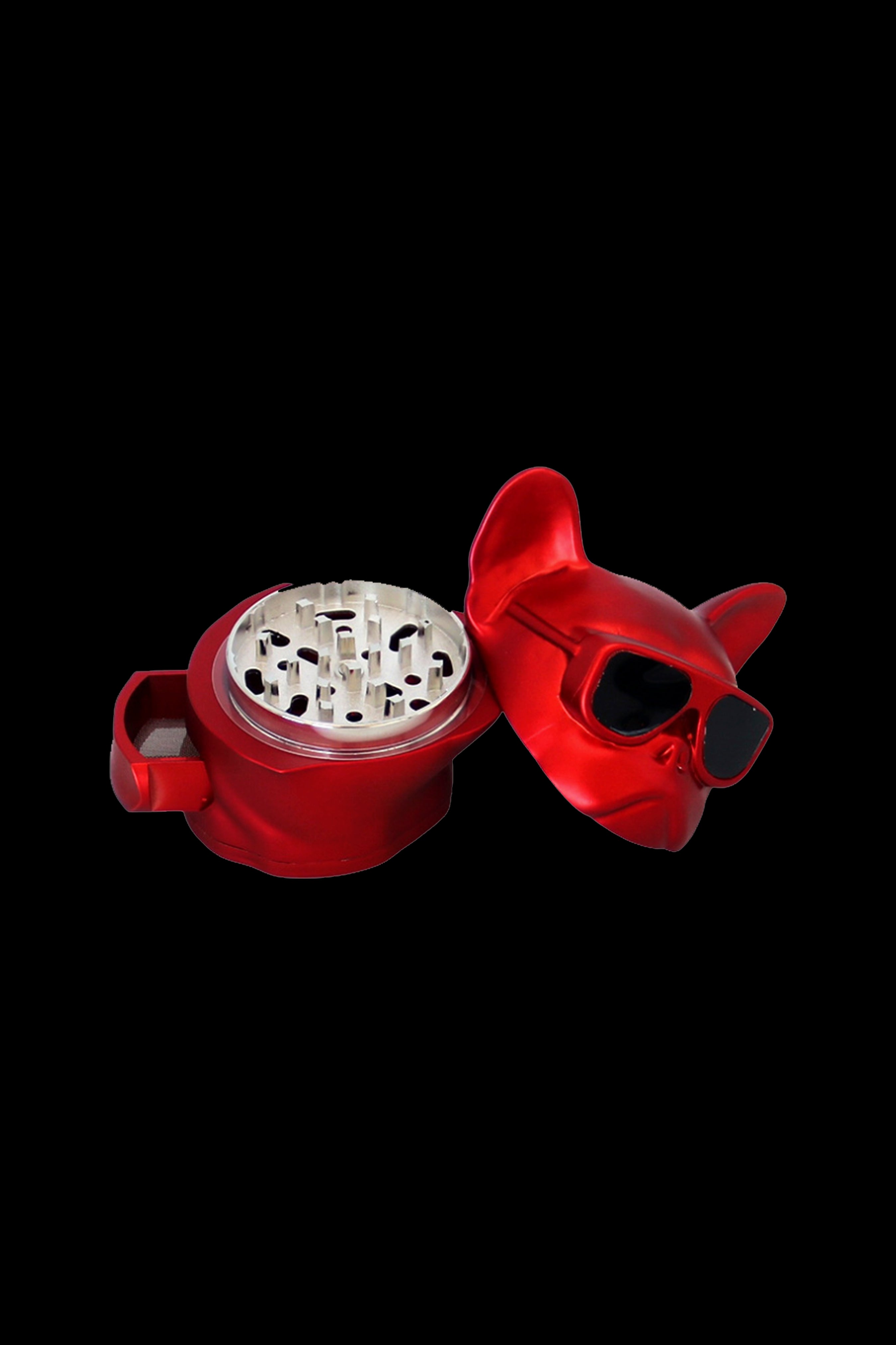 Red grinder shaped like a dog head, open to reveal metal grinding teeth.