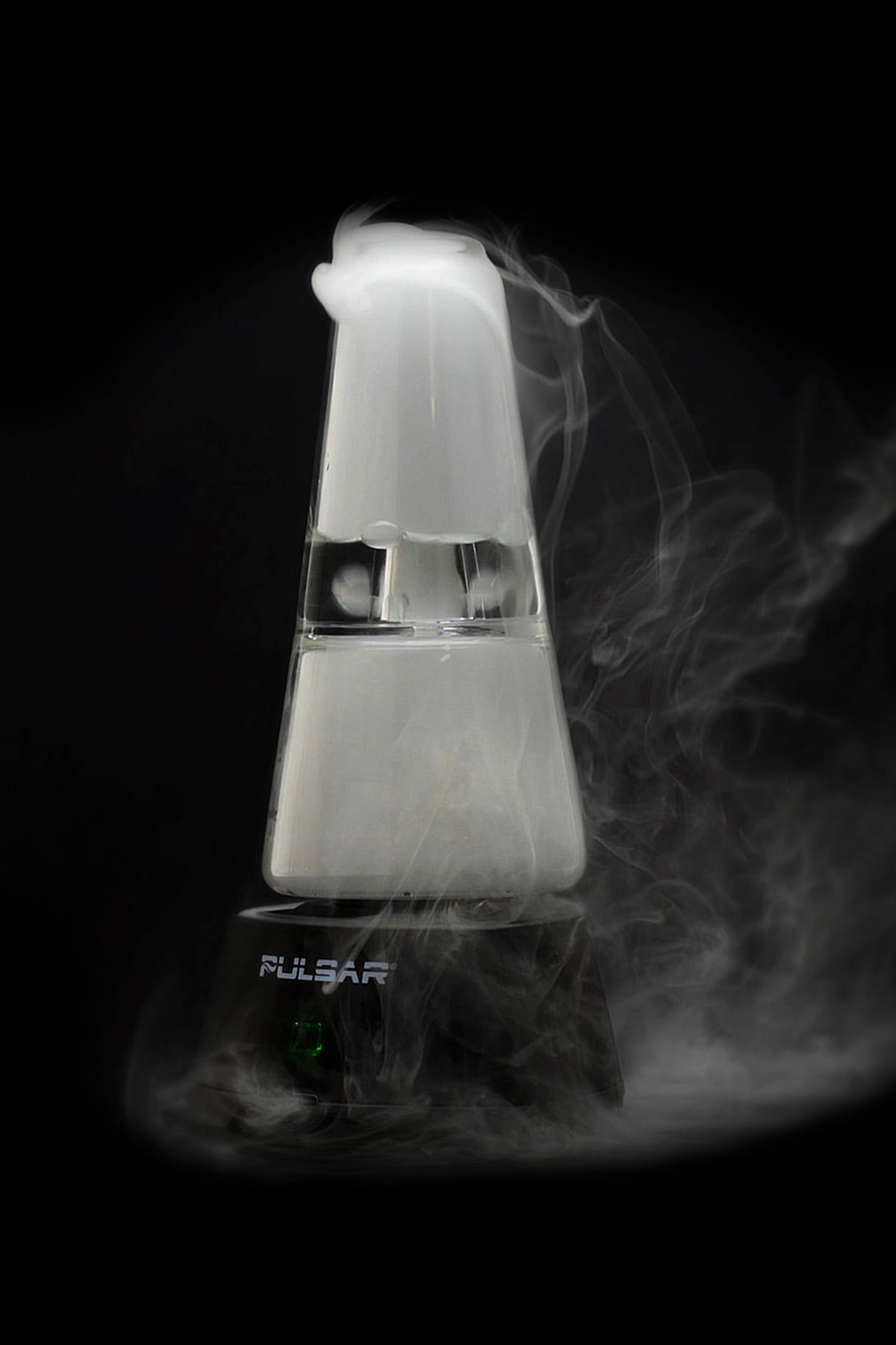 A vaporizing device emitting thick, white vapor against a dark background, displaying the brand name "Pulsar."