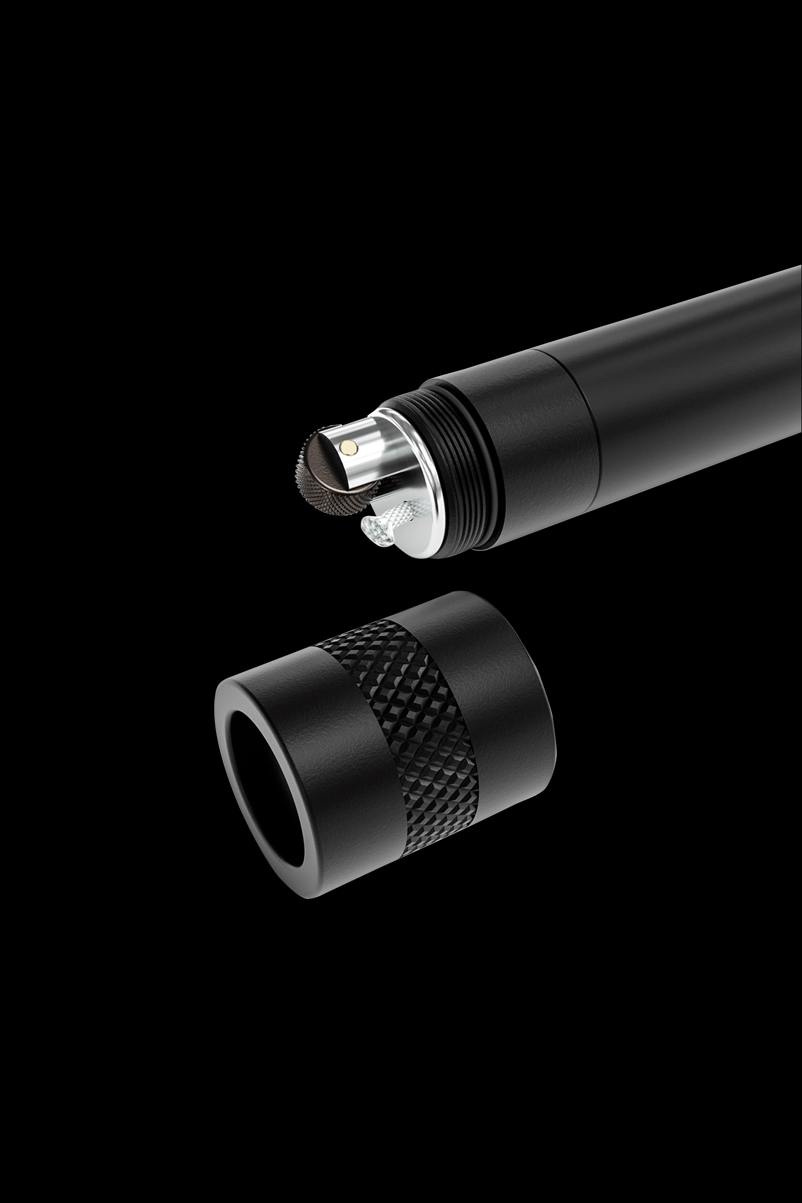 Black metal cannabis pipe components disassembled, showing a threaded connection.