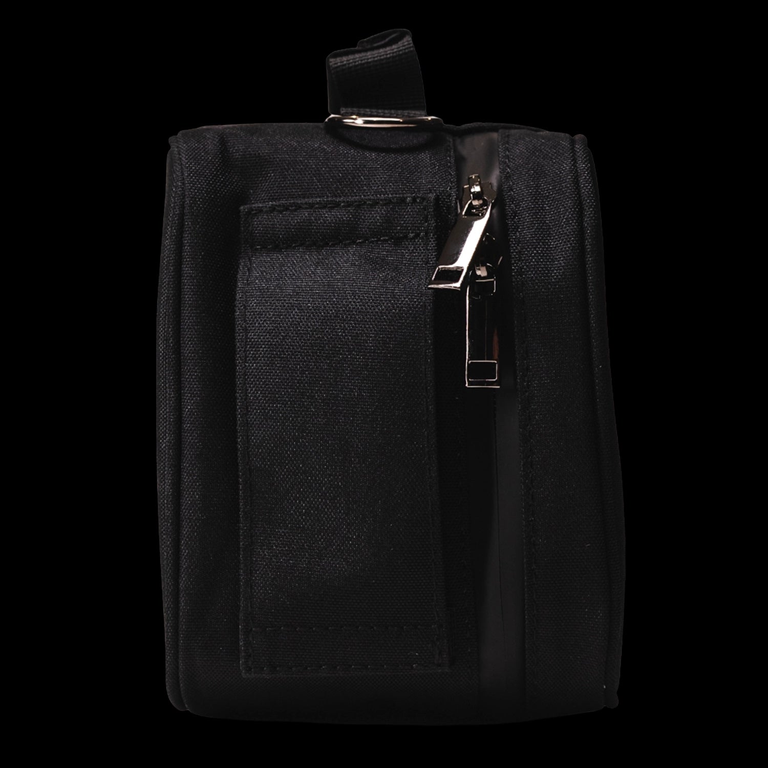 Close-up side view of a black fabric Blazy Susan Stash Bag showing a metal zipper pull, stitched pocket flap, and top D-ring strap.