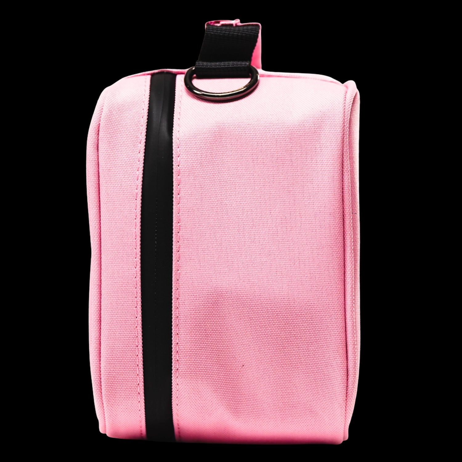 Close-up front view of the pink Blazy Susan Stash Bag showing its black vertical zipper strip and metal D-ring tab against a black background
