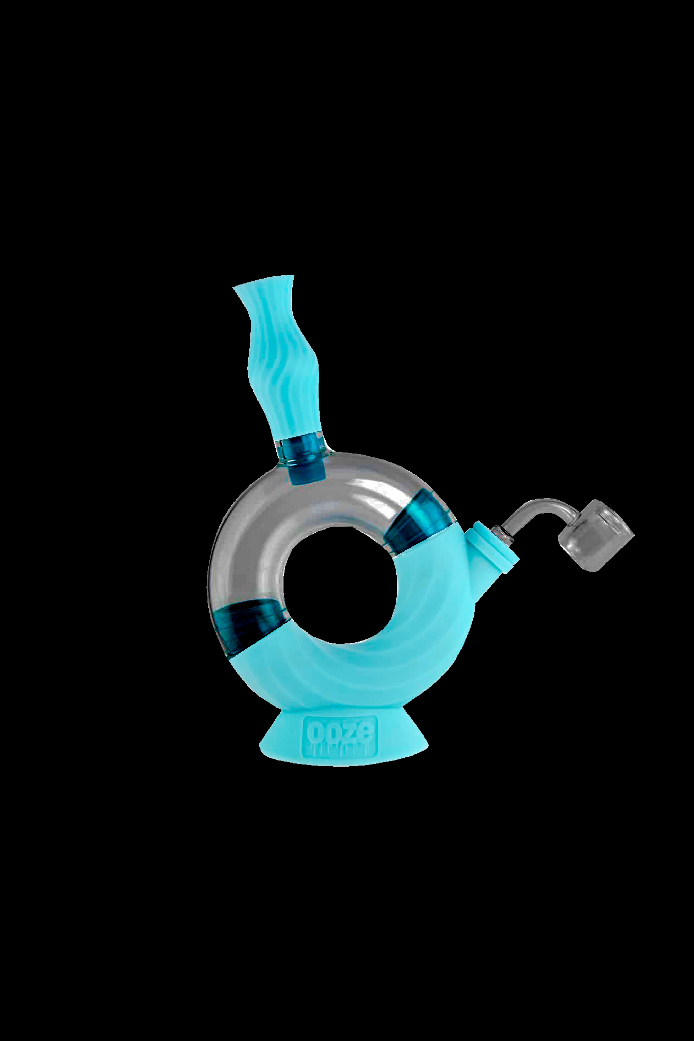 Blue glass bubbler water pipe with clear accents and a small bowl.