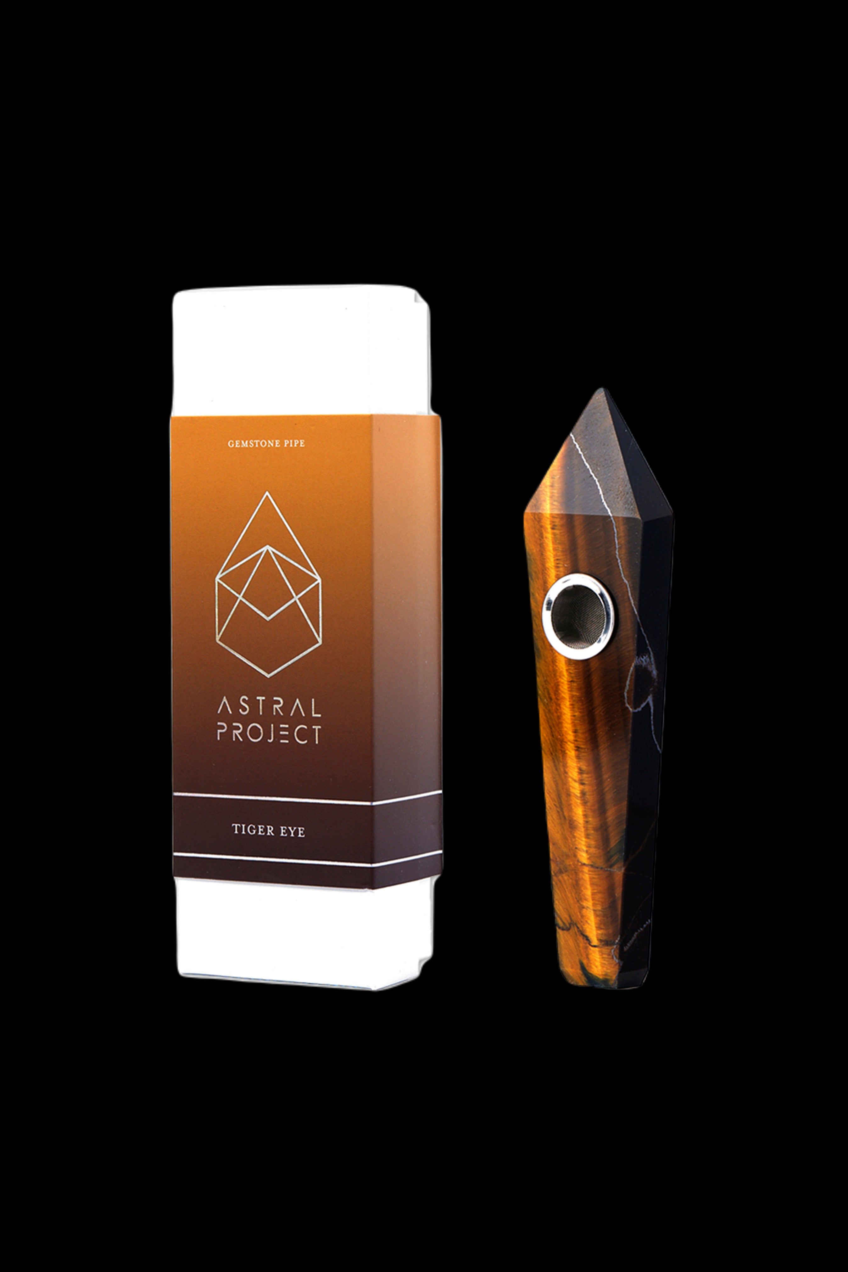 A boxed gemstone pipe, specifically “Tiger Eye”, from Astral Project, displayed against a black background.