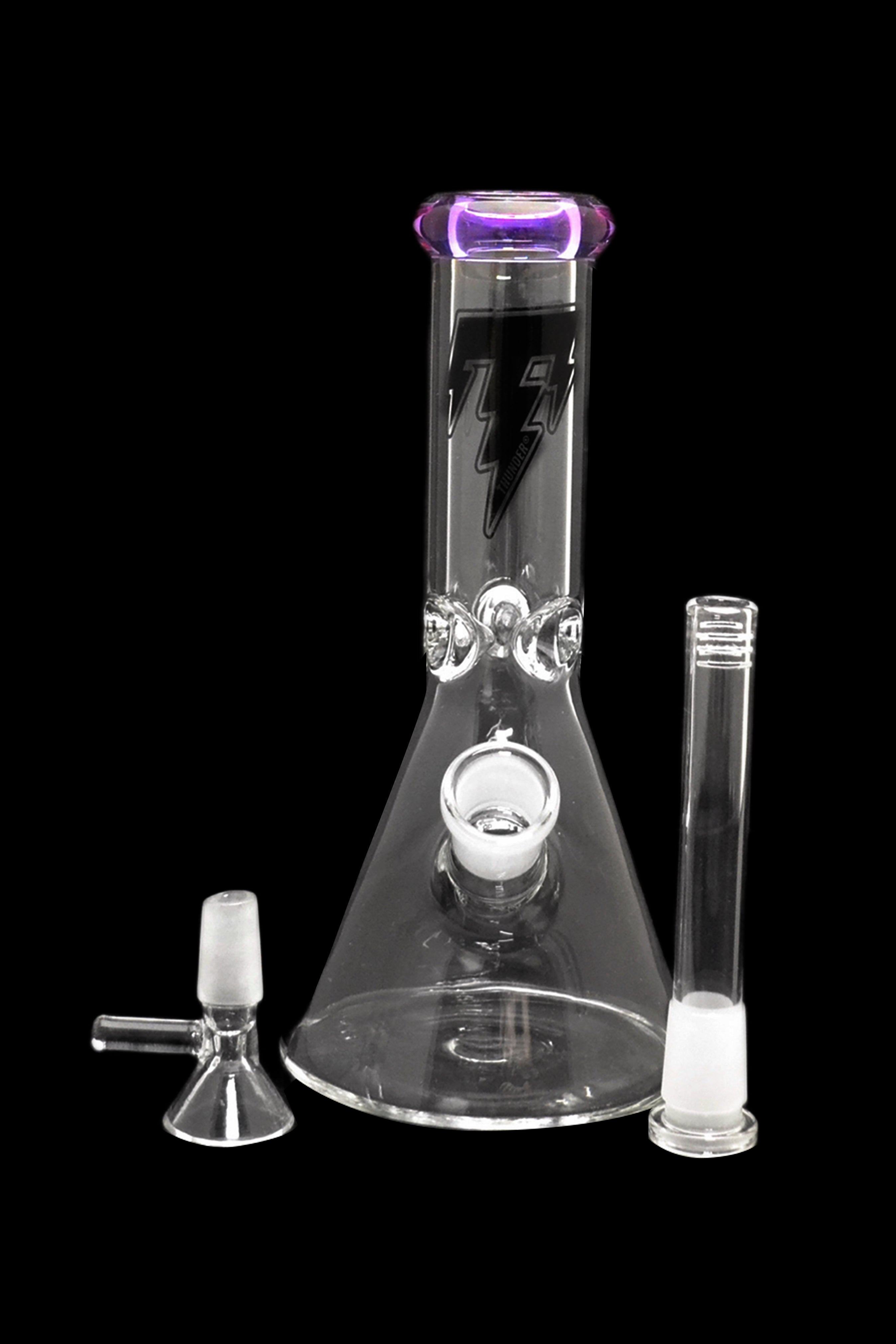 Glass bong with detachable downstem and bowl, isolated on a black background.