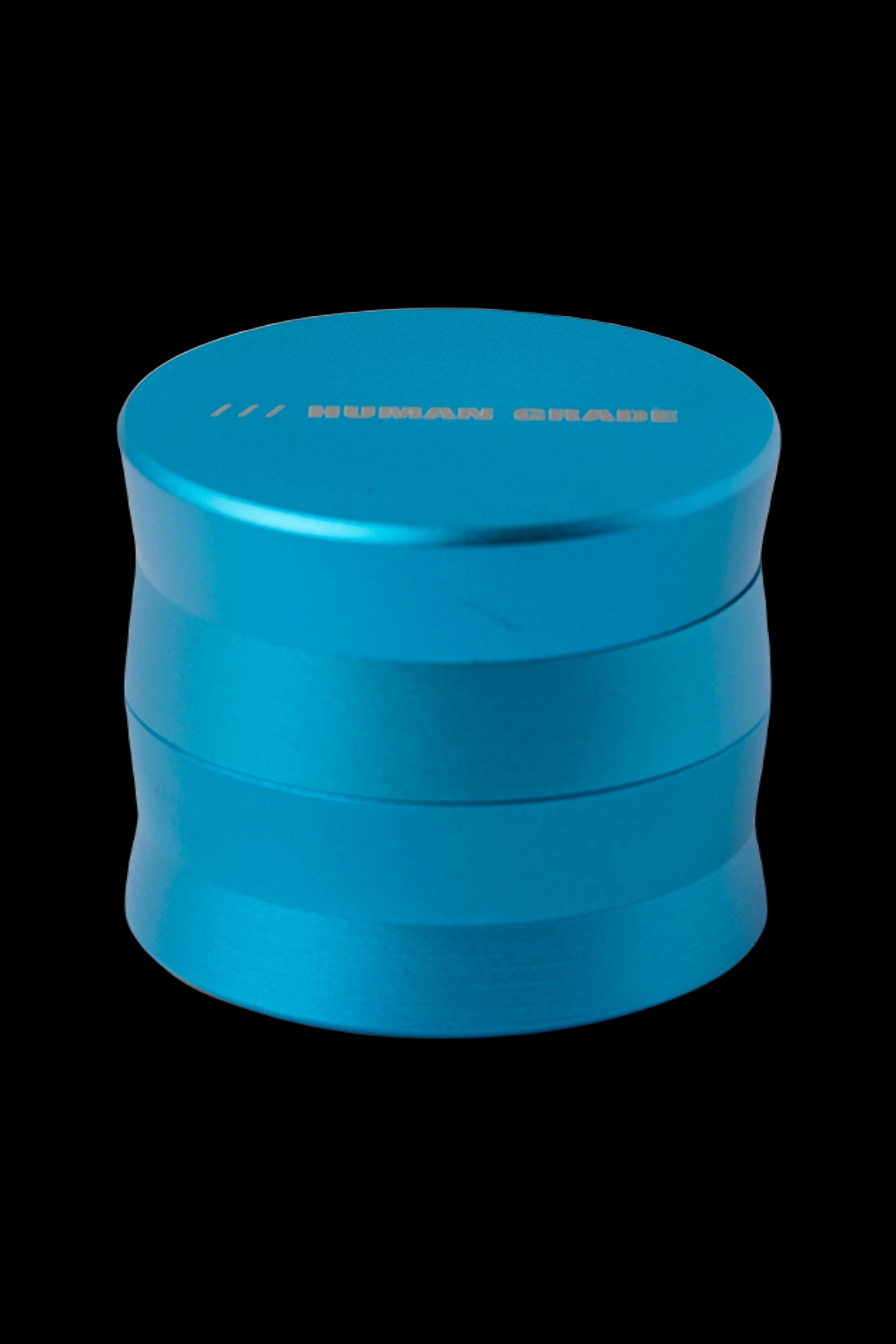 Blue four-piece cannabis grinder.