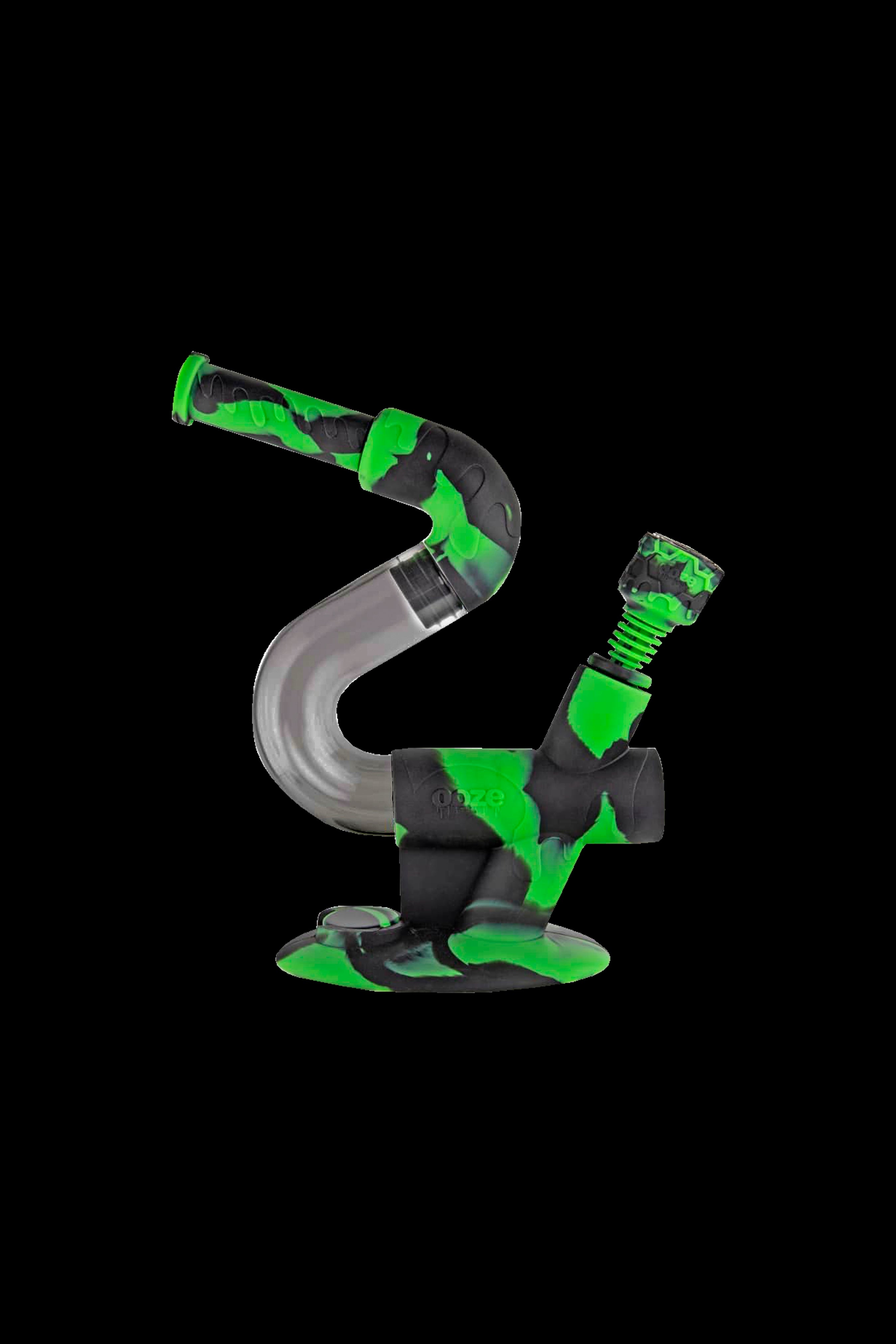 Green and black silicone water pipe (bong) against a black background.