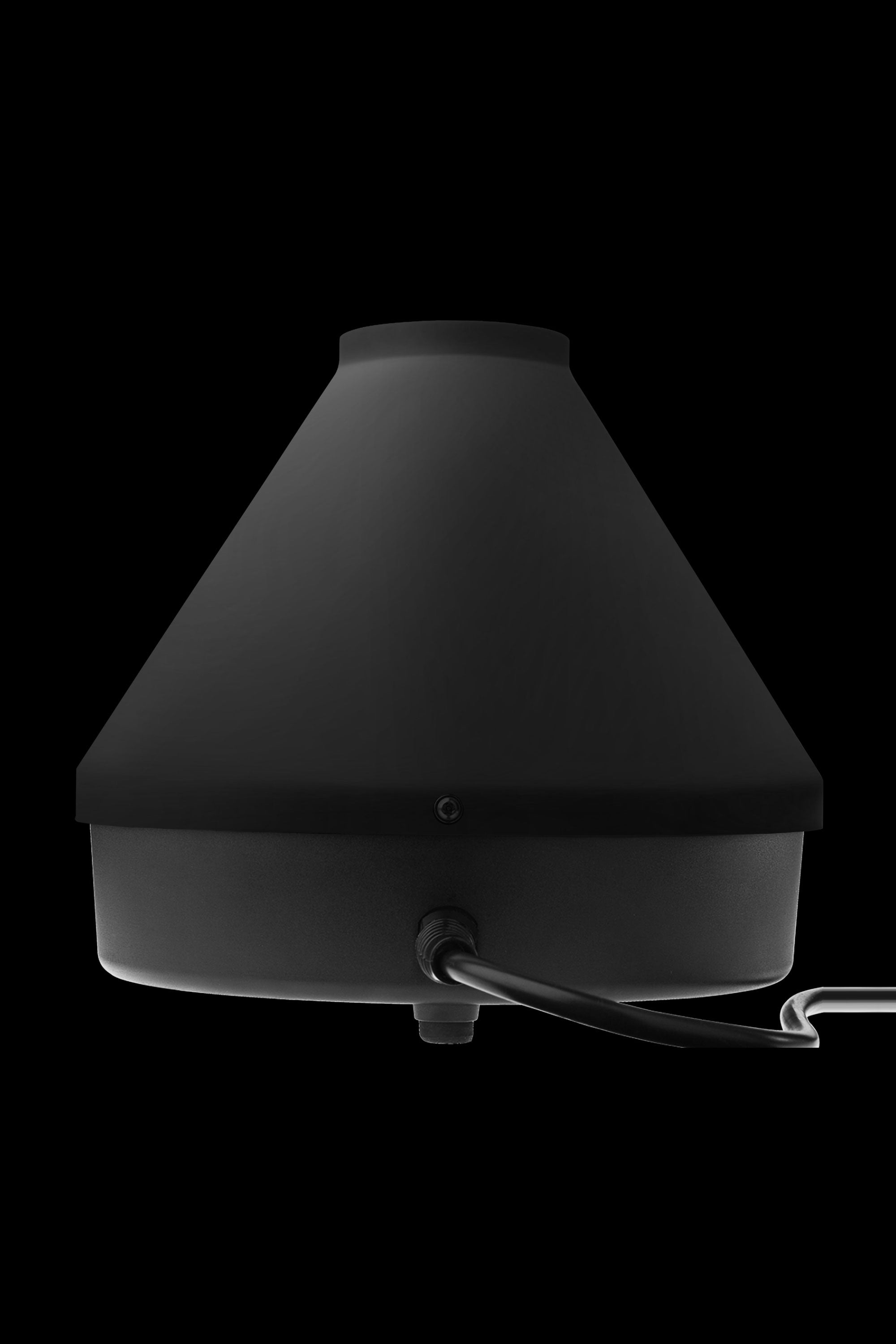 Black cannabis vaporizer on a dark background.