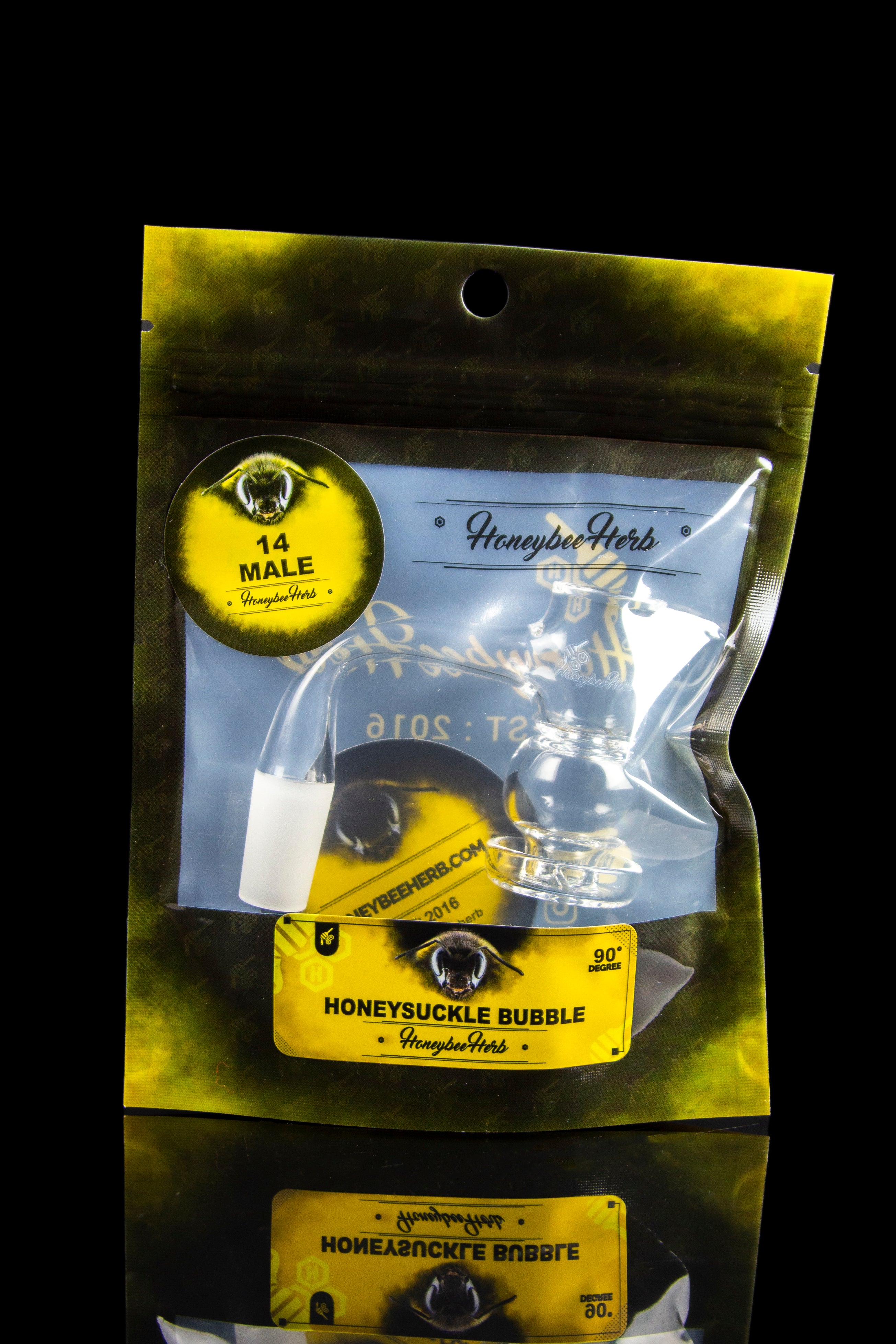 Black mylar bag with cannabis accessory inside, branded with “Honeybee Herb” and eye logo.