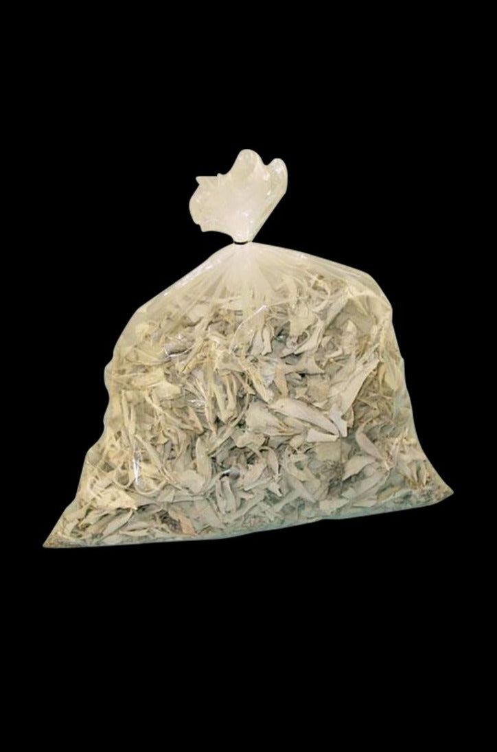 A plastic bag filled with Loose Sage 1lb, shown from a slightly above angle against a dark background.