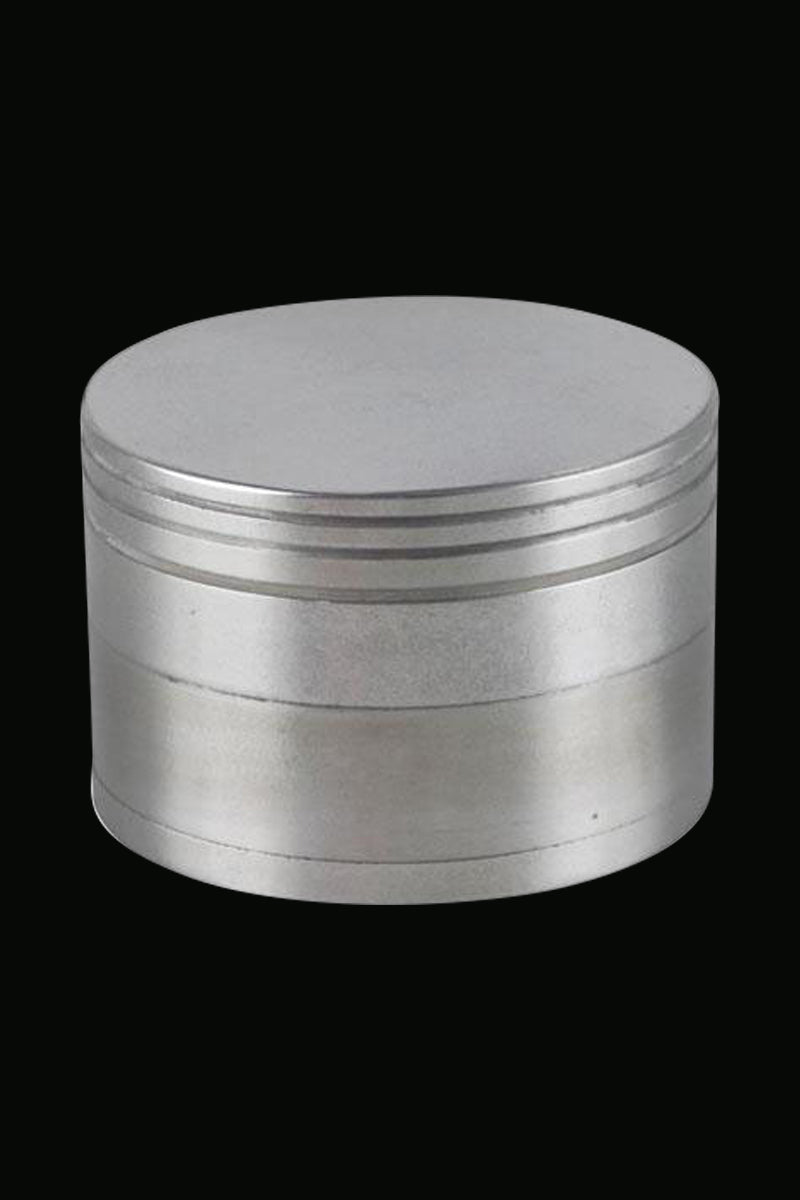 Front view of the Classic 4-Piece Metal Grinder, a silver, cylindrical device with visible ridges and a four-part construction.