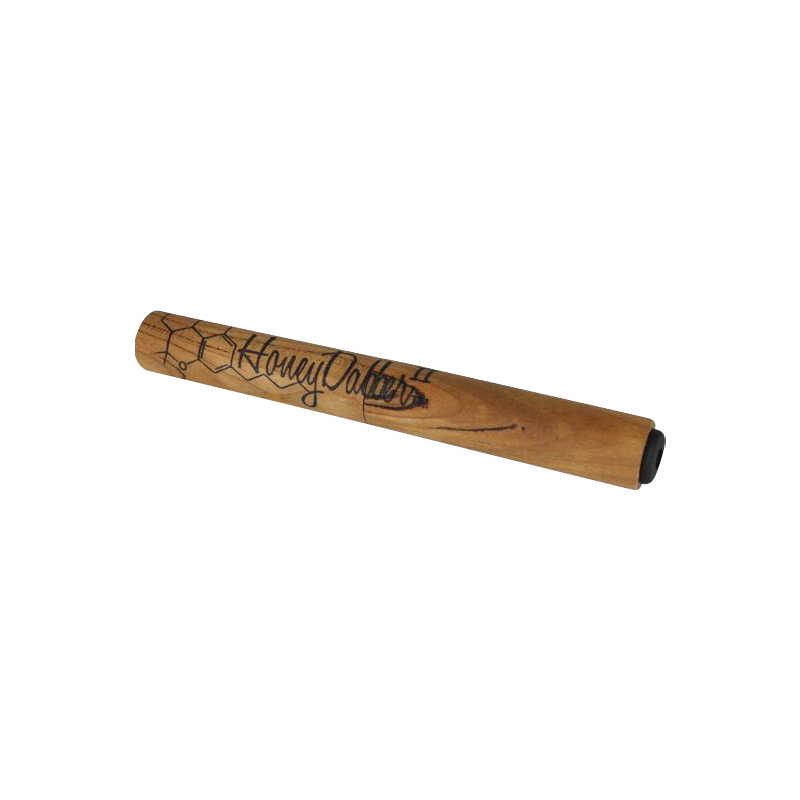 Angled close-up of a wood-grain Honey Dabber II Vapor Straw Collector with black honeycomb and script branding along its tapered body.