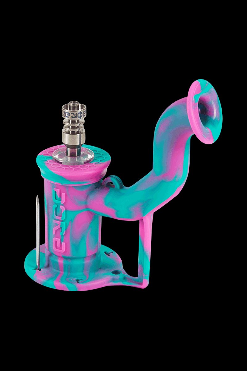 Angled front view of an EYCE Rig II Silicone Bong in a swirled pink-and-teal "Estonia" pattern against a black background, showing the curved mouthpiece, chamber, metal nail, and embossed EYCE logo.