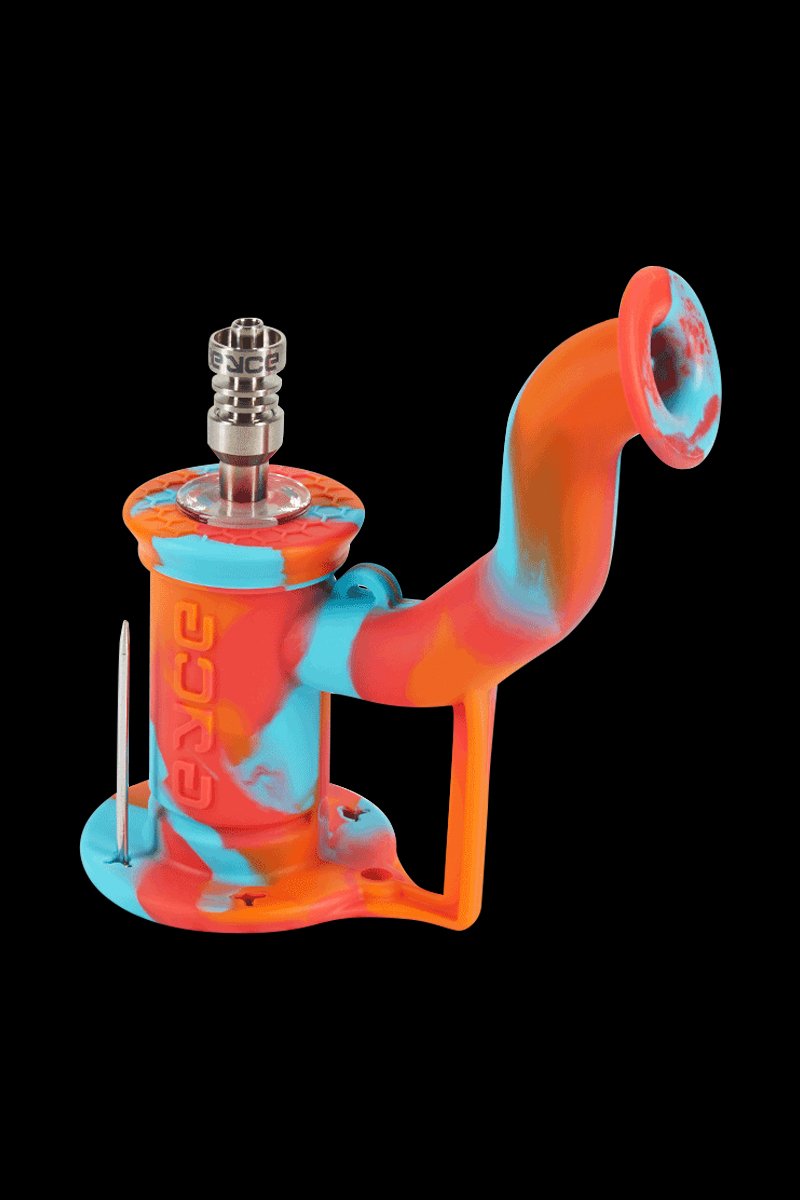 Angled front view of the colorful Diamond Blue EYCE Rig II Silicone Bong against a black background, showing its curved mouthpiece, base, and metal nail.