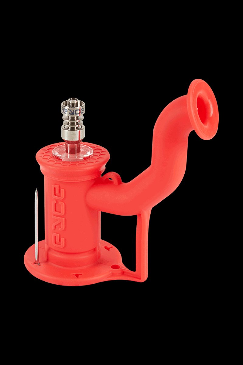 Angled studio shot of a black-background red EYCE Rig II Silicone Bong showing its curved mouthpiece, textured top, and metal nail insert.