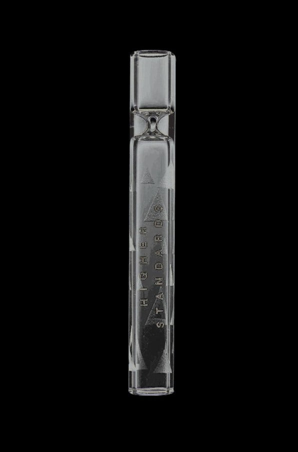 Straight-on view of a clear glass Higher Standards Glass Taster tube with embossed branding visible against a black background.