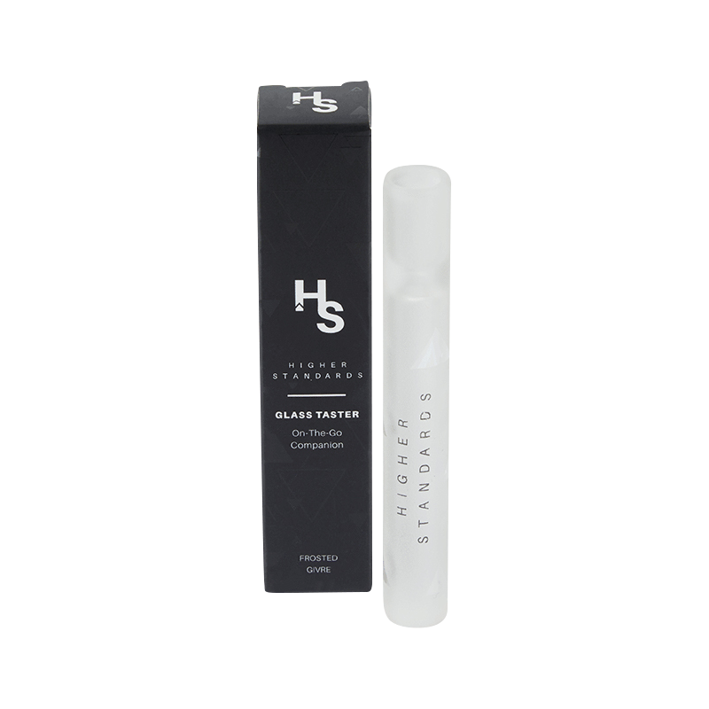Front view of the Higher Standards Glass Taster standing upright beside its black branded box on a white background.