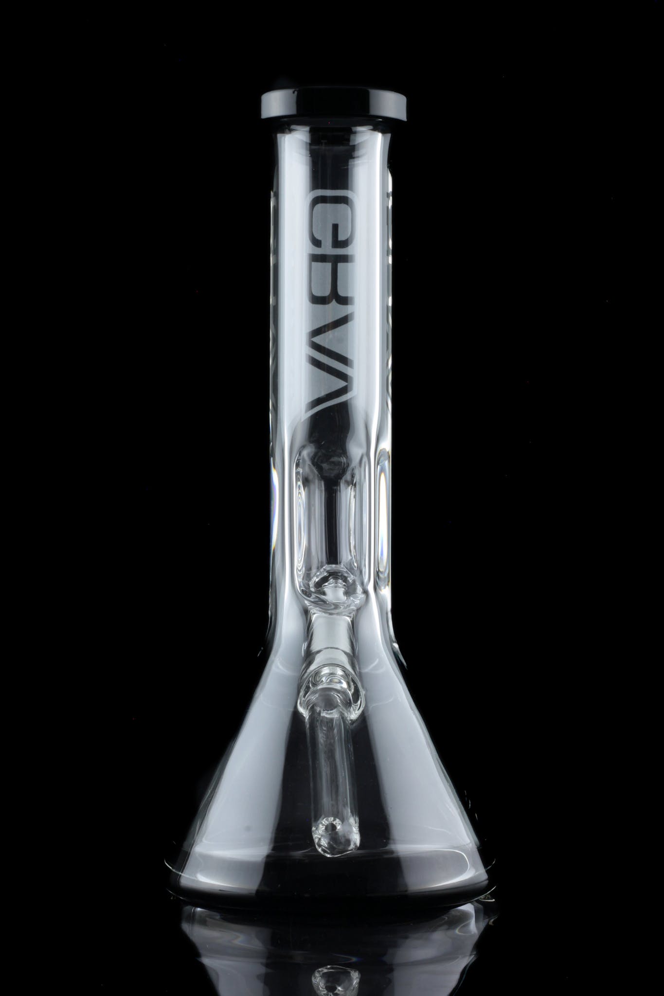 Clear glass water pipe (bong) with ice catch and brand logo, reflecting on a dark surface.