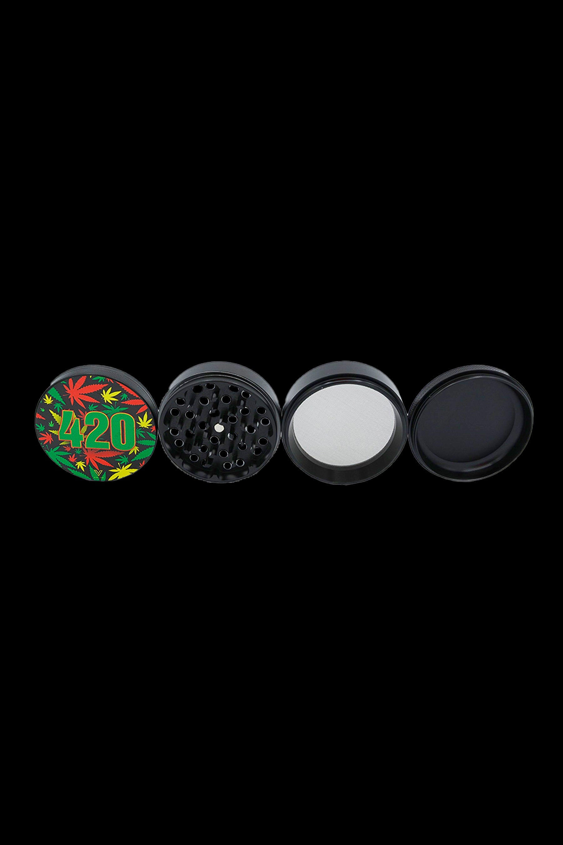 Cannabis grinder with four parts, featuring a 420 and leaf design on the lid, displayed on a black background.