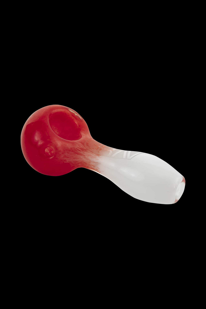 A side view of the GRAV® Frit Spoon, displaying its curved glass bowl and smooth, speckled frit finish.