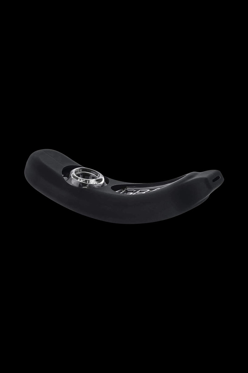 Angled front view of a black GRAV® Rocker Steamroller with Silicone Skin showing its curved silicone body and exposed clear glass bowl against a black background.