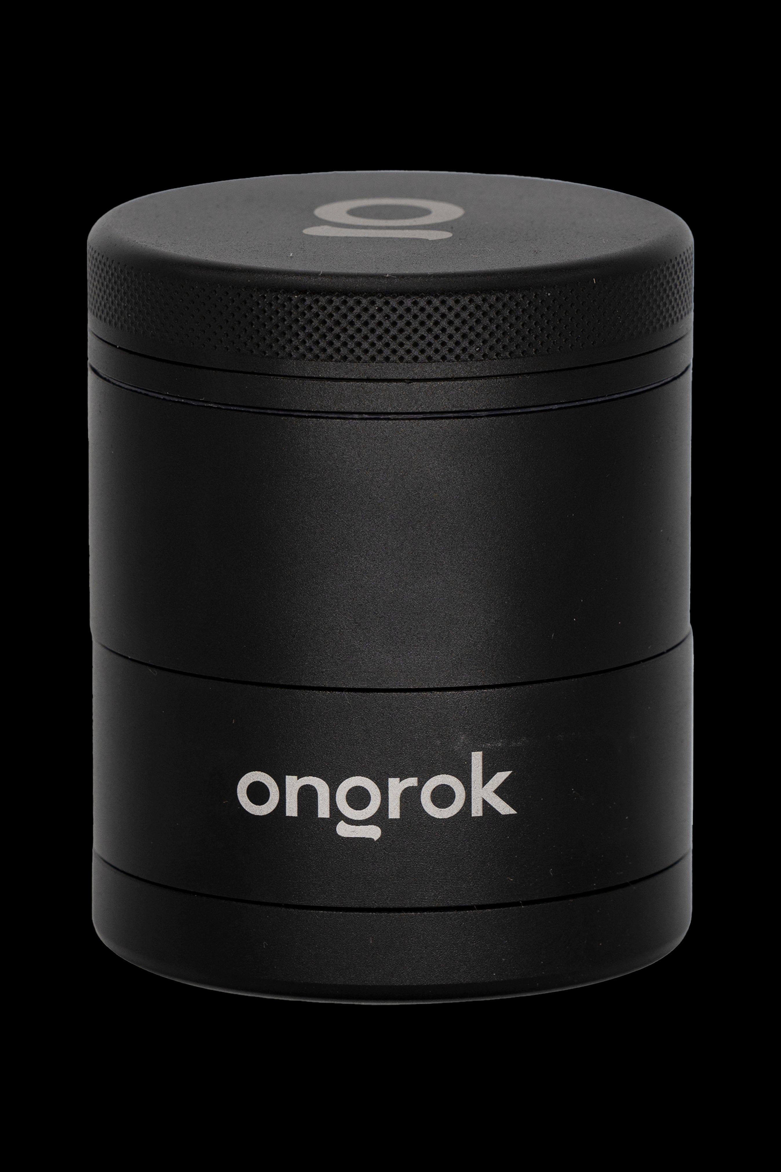 Black four-layer cannabis grinder with “onrok” logo.