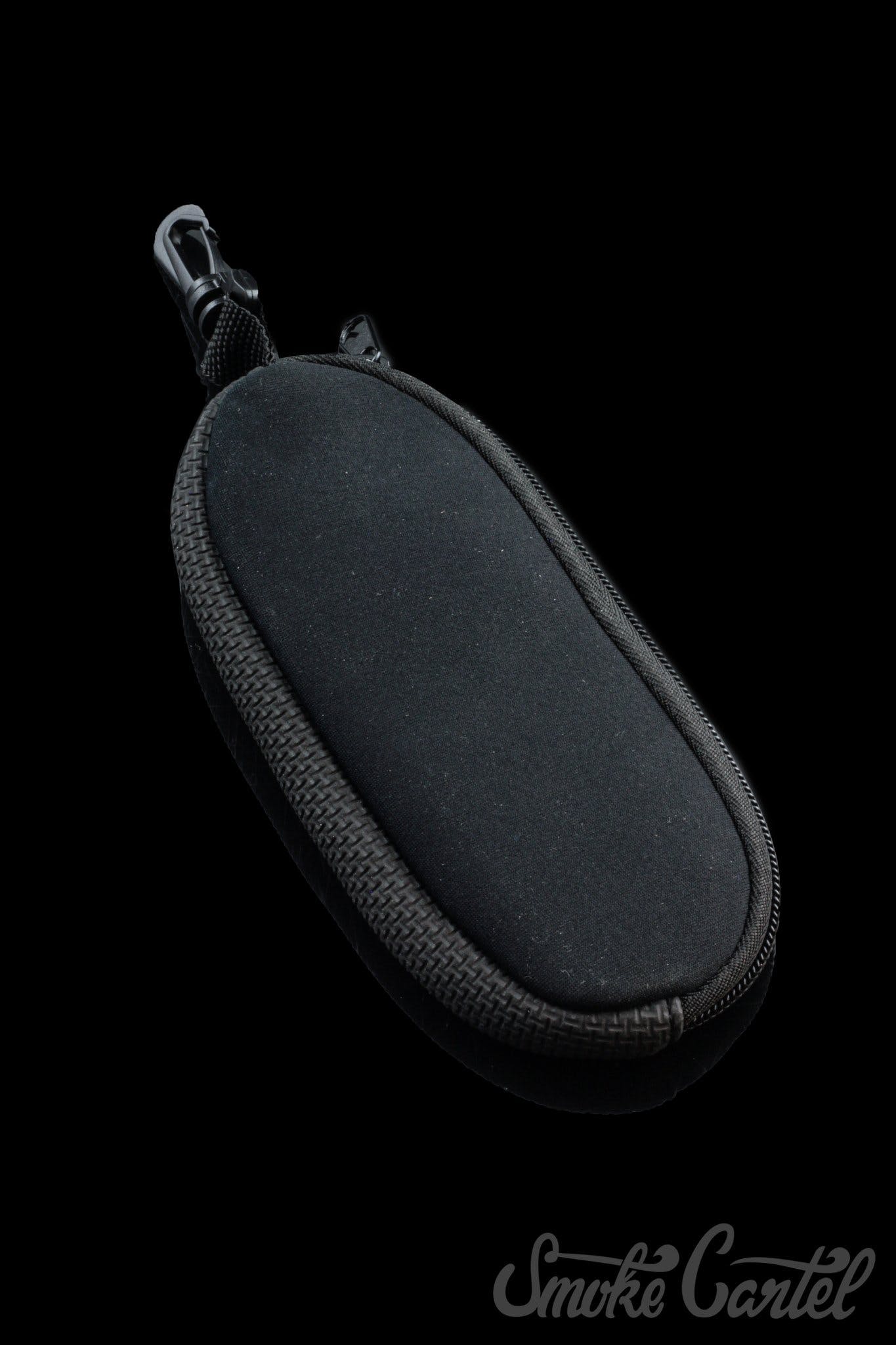 A close-up of the black Dip Devices Soft Carry Case, showing its zippered closure and loop for attachment.