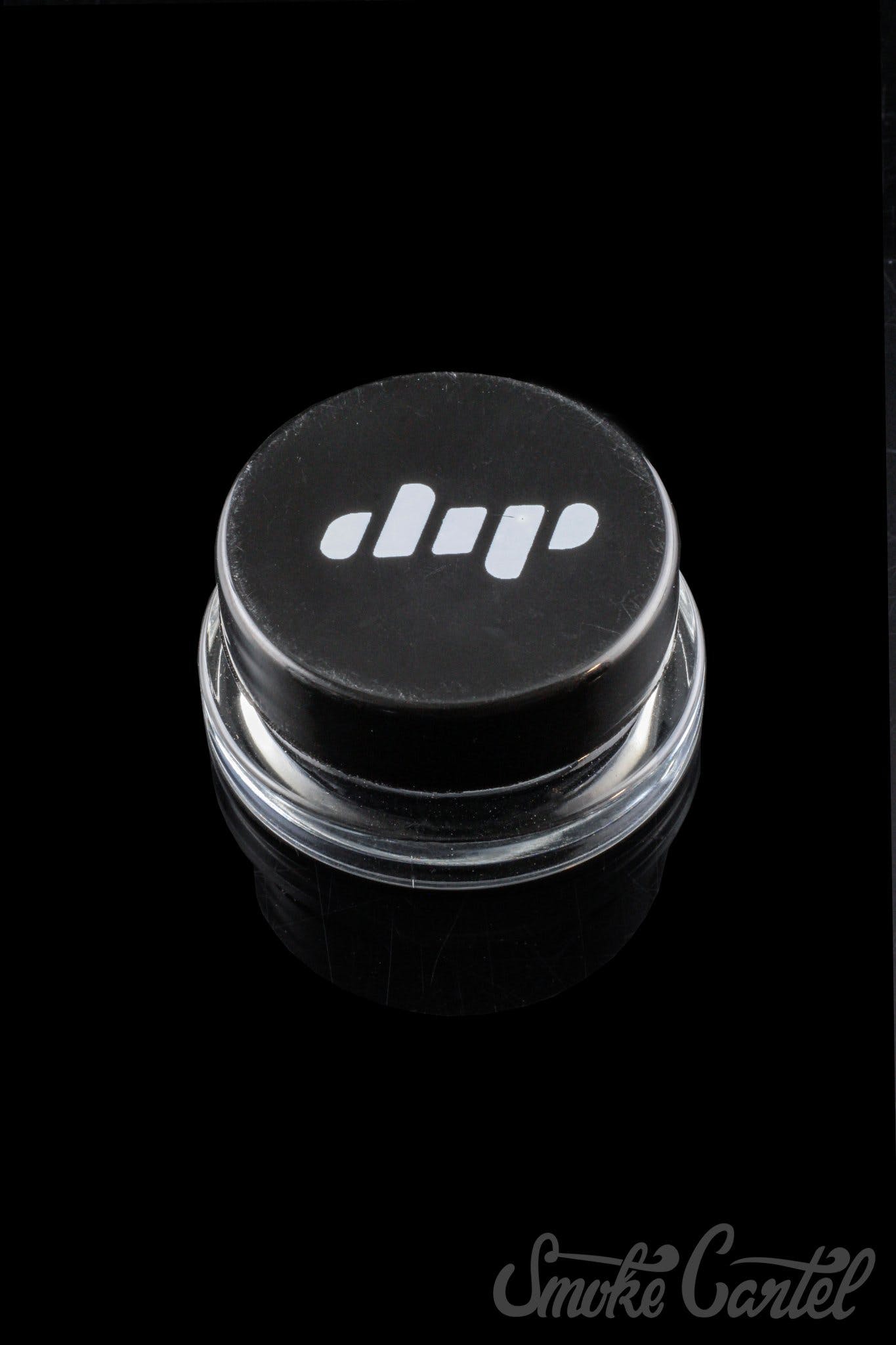 A close-up shot of the clear glass Dip Devices 9mL Container, showing its simple, cylindrical shape and screw-on lid.