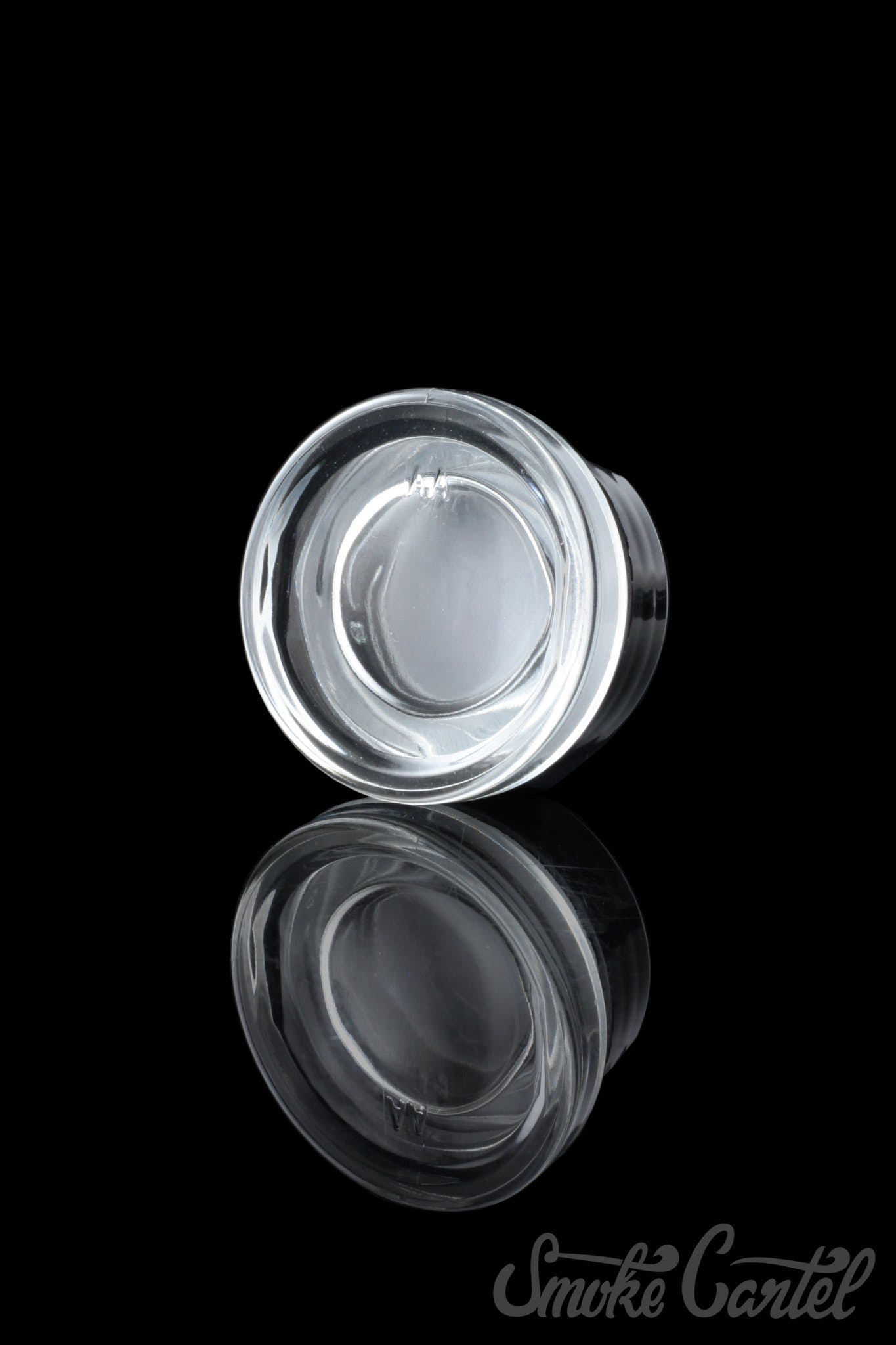 A studio shot of the 9mL Dip Devices glass container, showcasing its clear, cylindrical shape against a dark background.