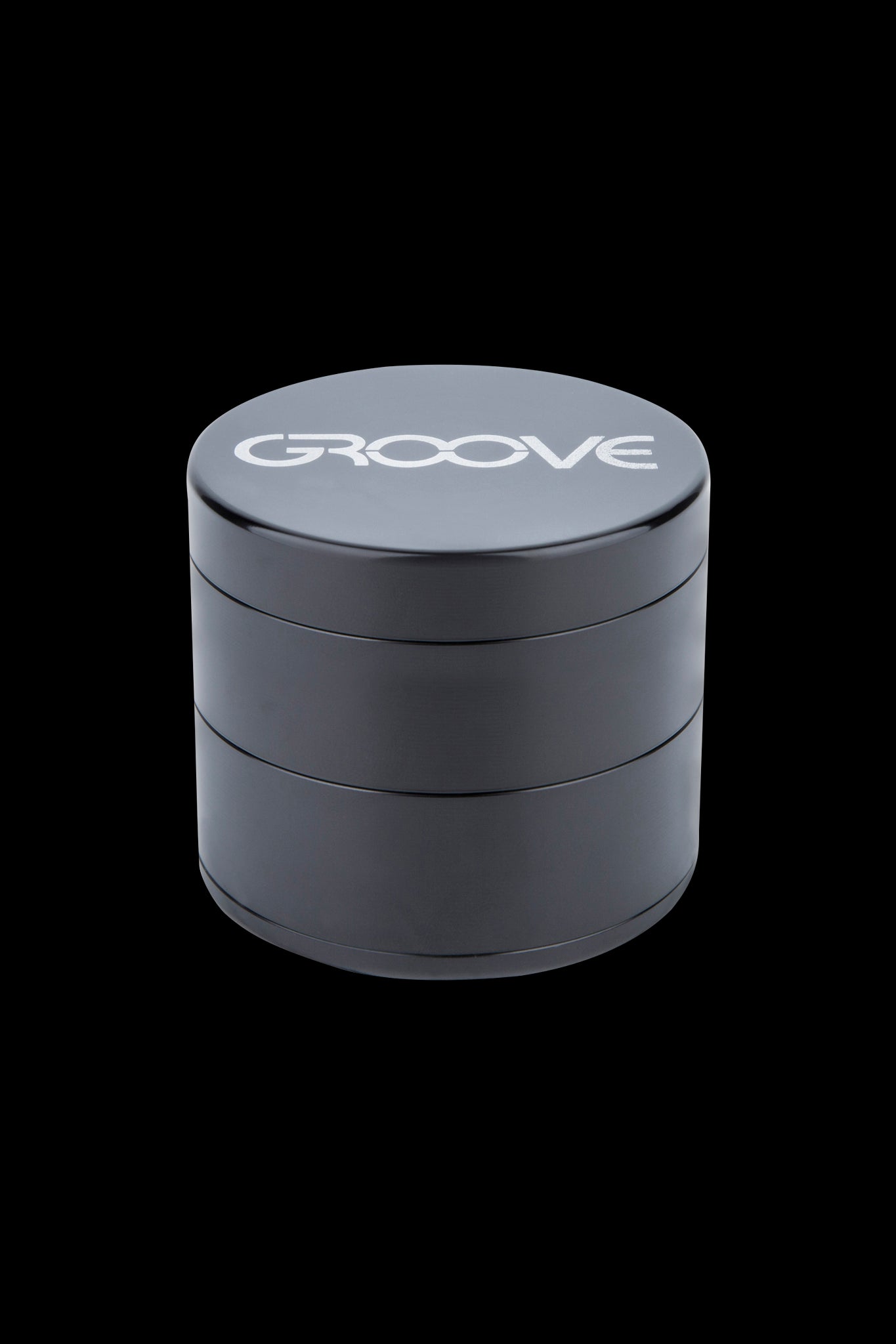 Black four-layer cannabis grinder with “GROOVE” logo on the lid.