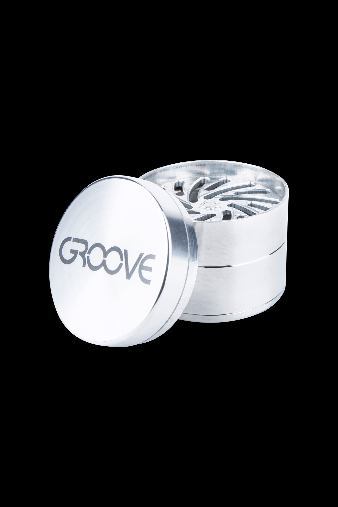 Silver cannabis grinder with “GROOVE” logo, partially open to reveal ground herb.