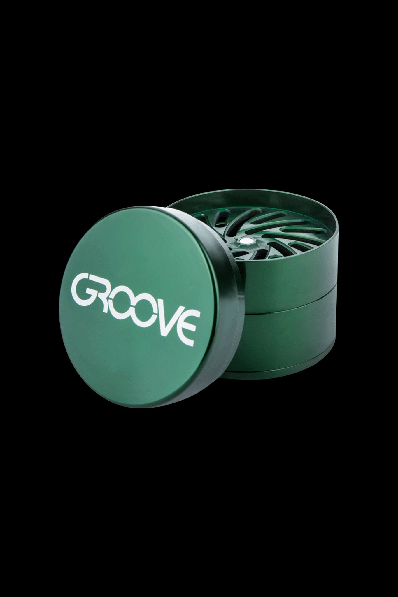 Green metal cannabis grinder with “GROOVE” text on the lid, open to reveal the grinding teeth.