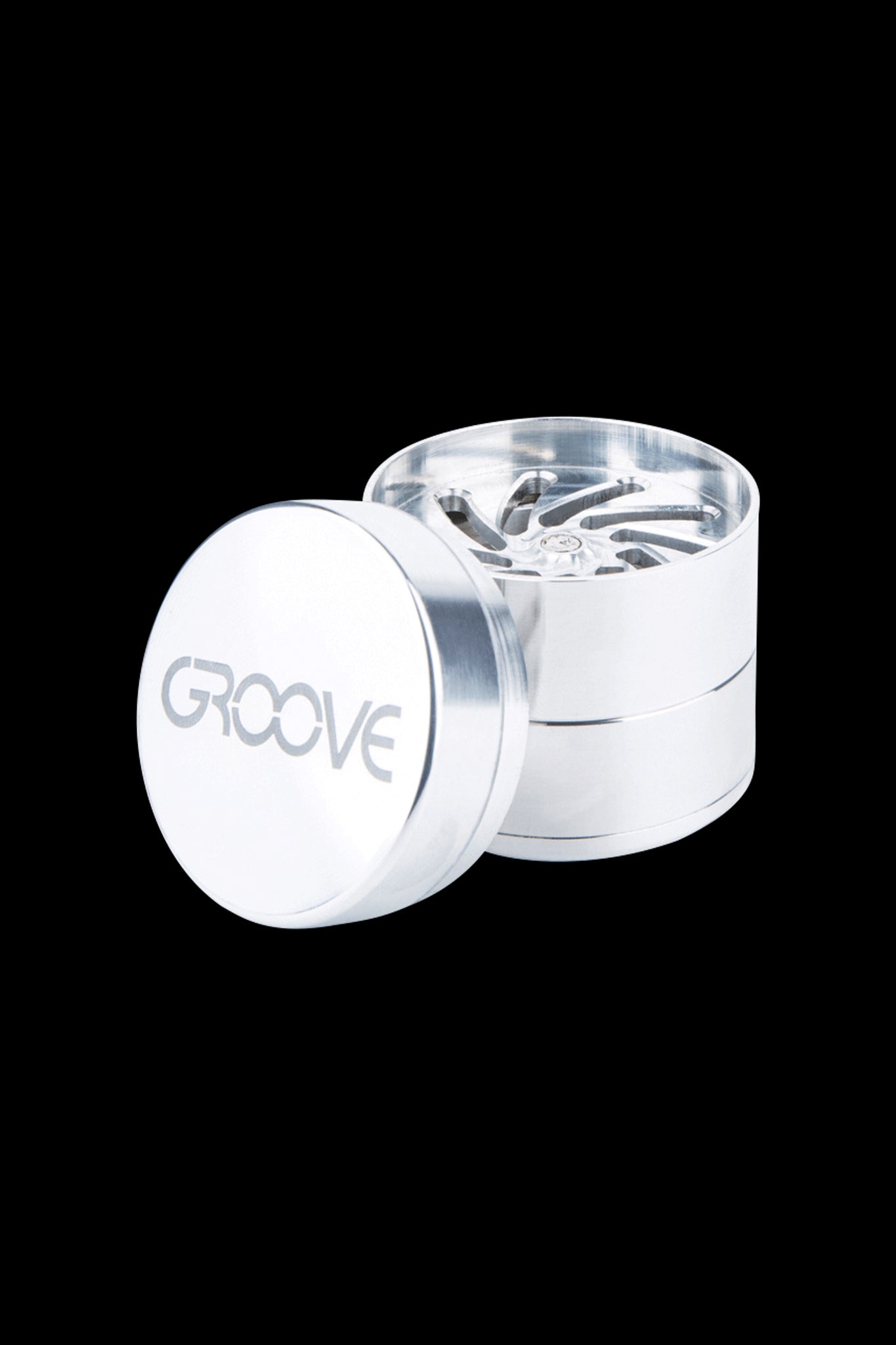 Silver cannabis grinder with "GROOVE" etched on the lid, partially disassembled to show the internal grinding mechanism.