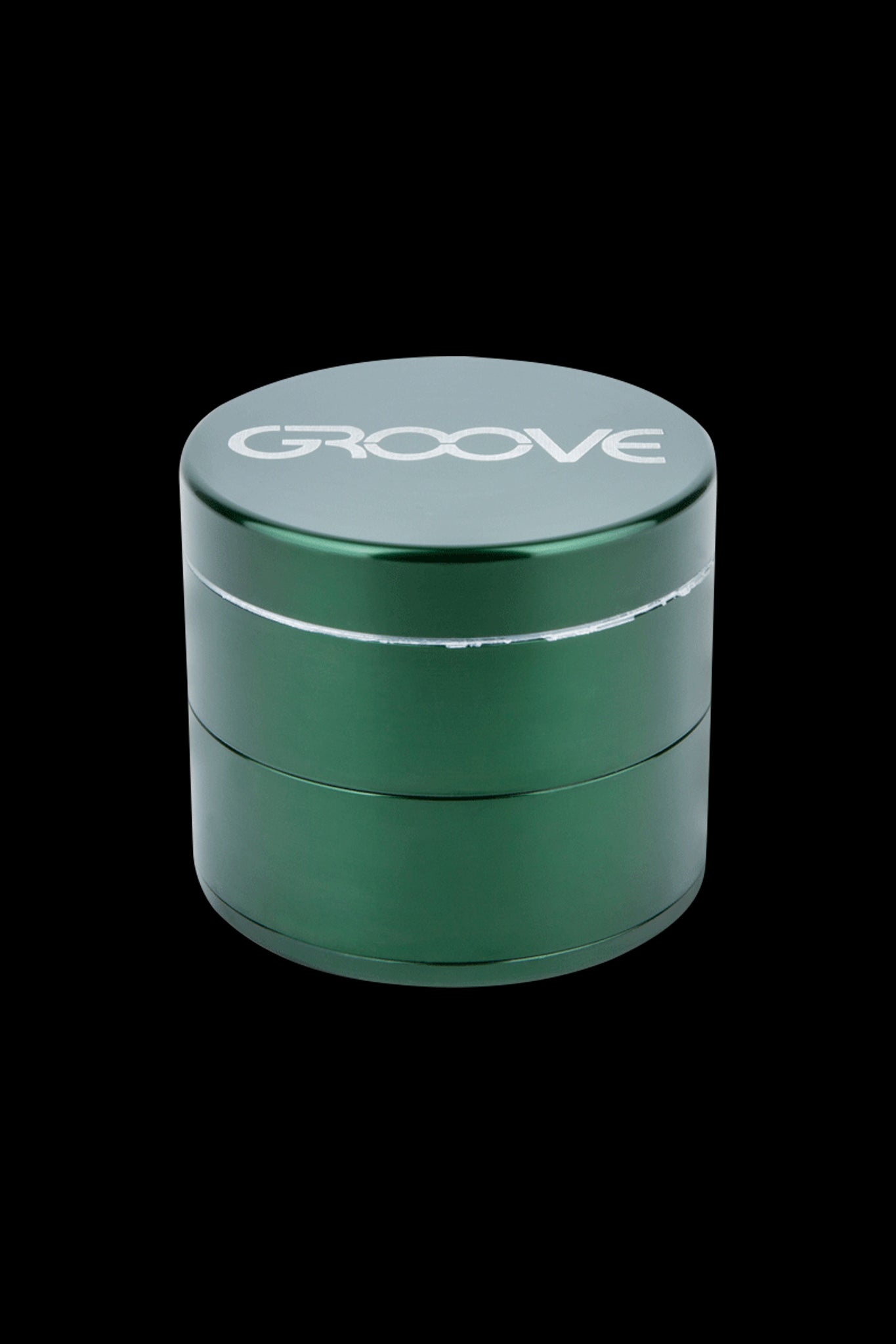 Dark green four-piece metal grinder with “GROOVE” logo on the lid.