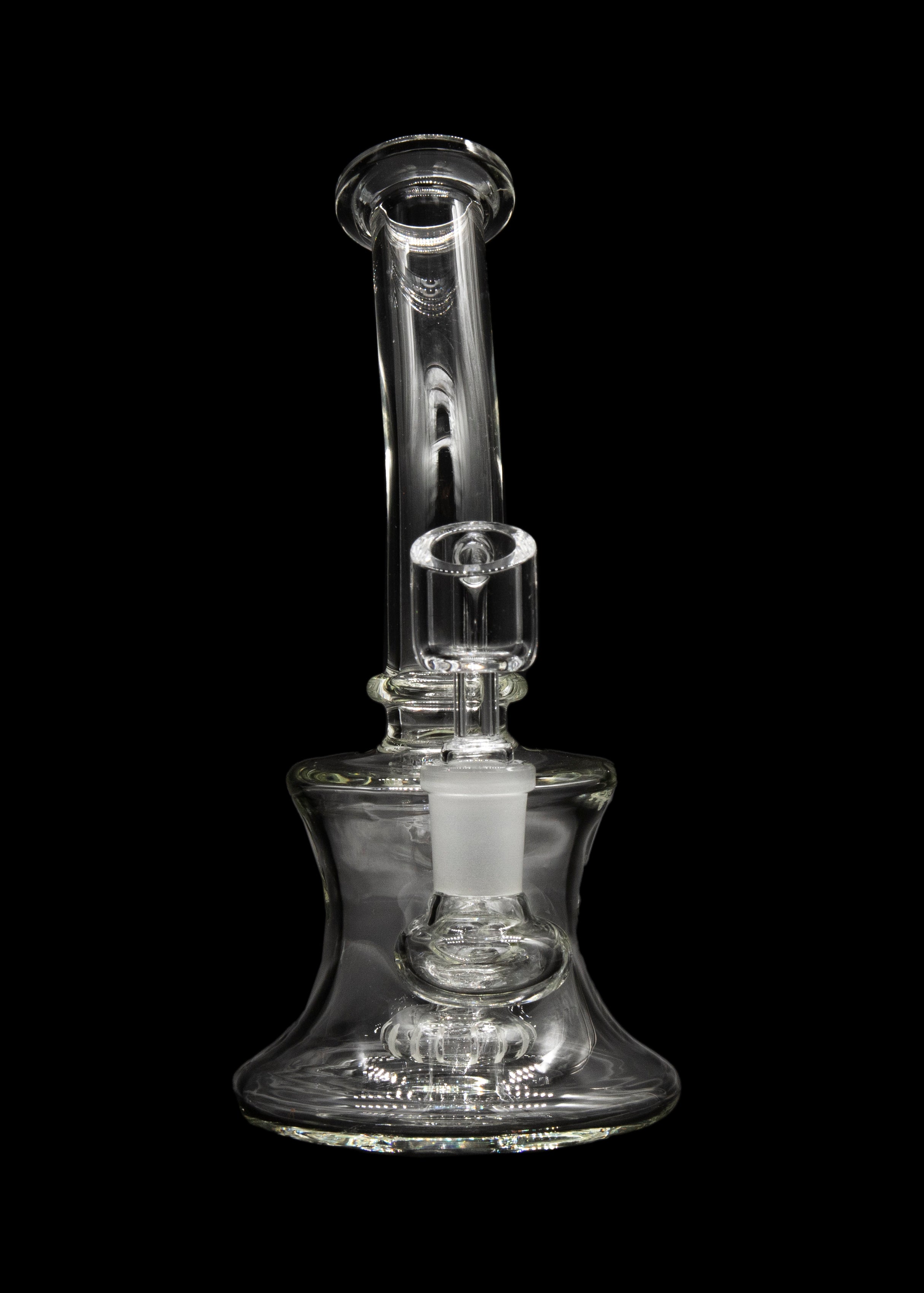 Clear glass bubbler water pipe against a black background.