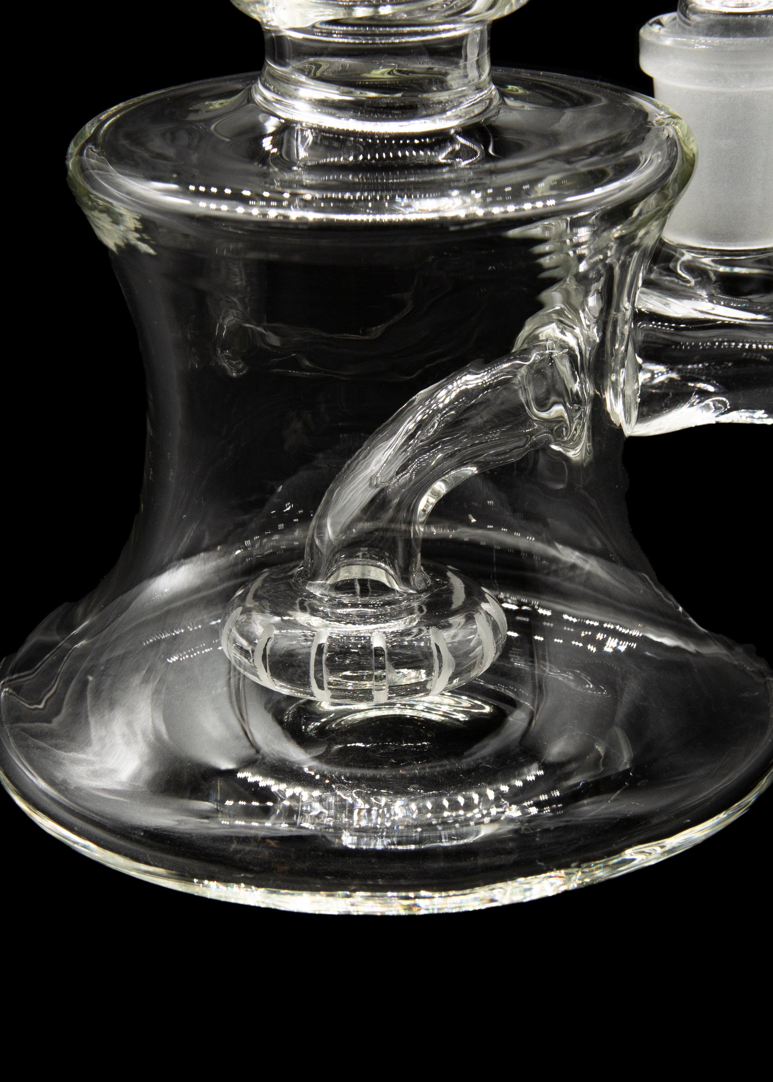 Clear glass water pipe (bong) with intricate percolator design.