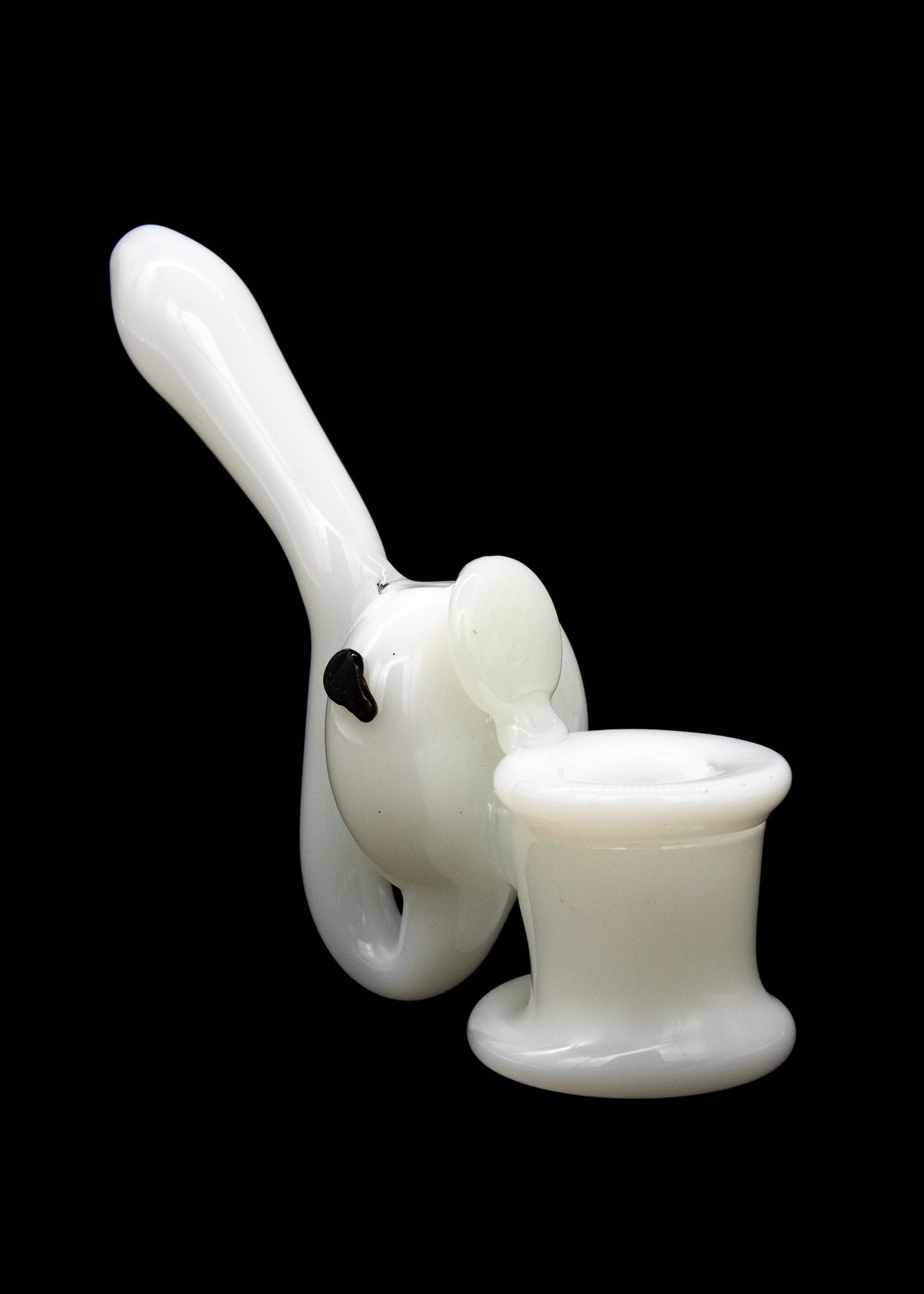 White glass rig with a bubbler and bowl, isolated on a black background.