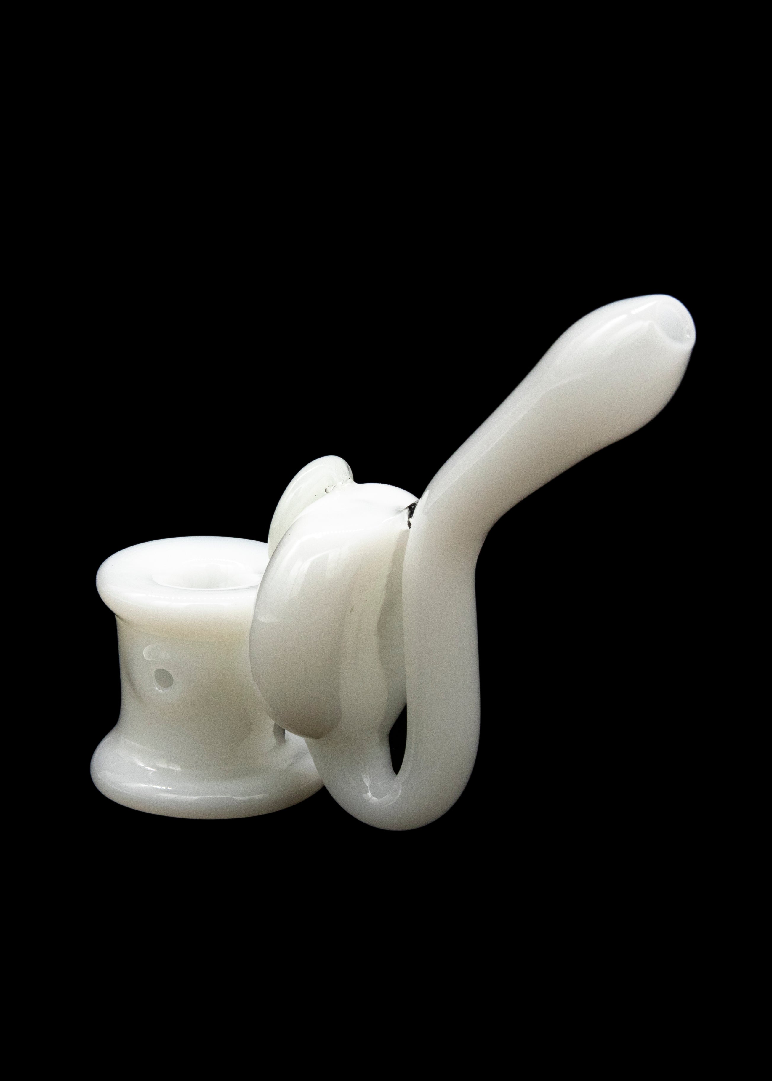 White glass bubbler shaped like a cat, side view on a black background.