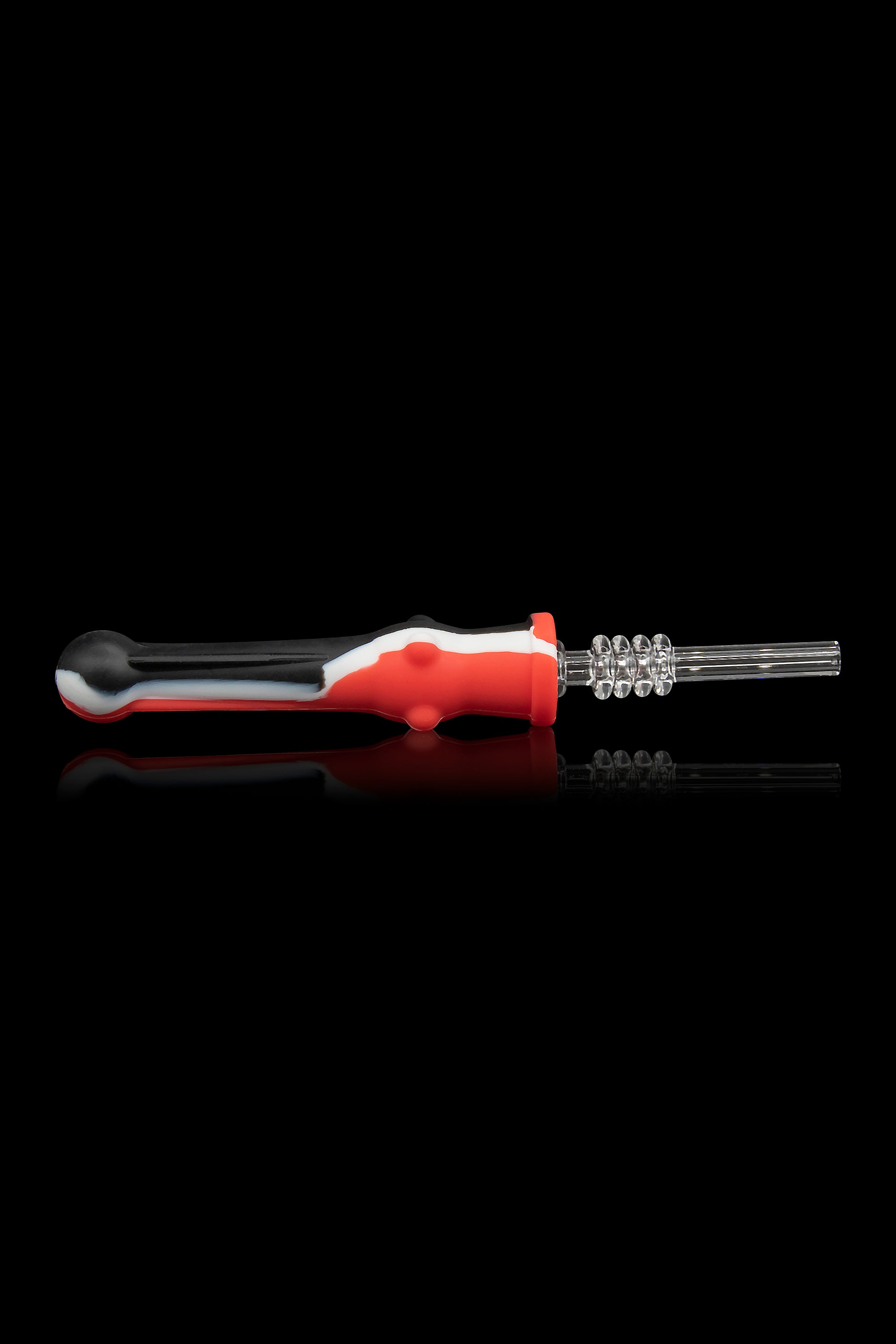 Red and white dab tool with a spherical tip and coiled heating element, reflecting on a glossy black surface.