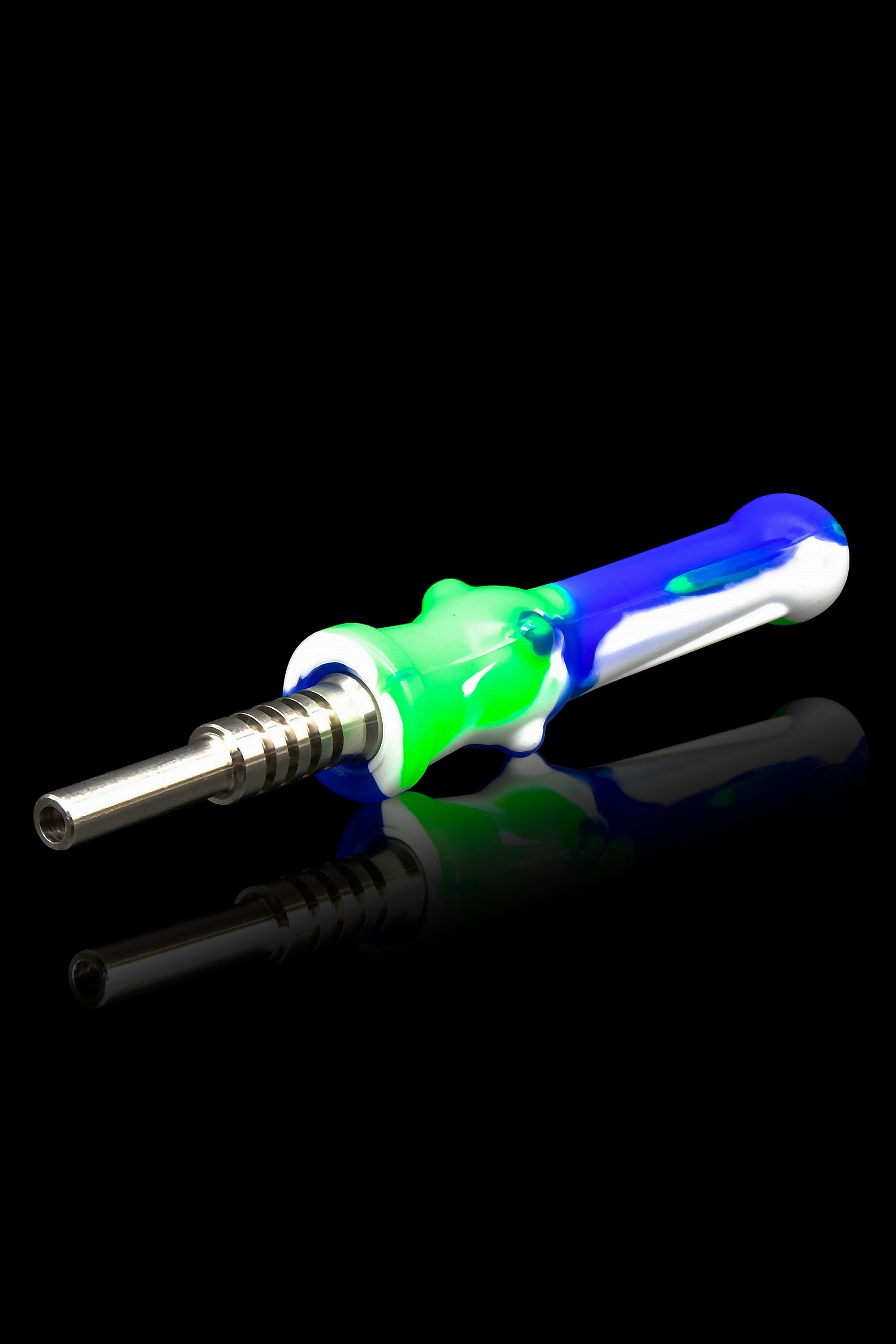 Colorful dab tool with stainless steel tip and silicone handle, isolated on a black reflective surface.
