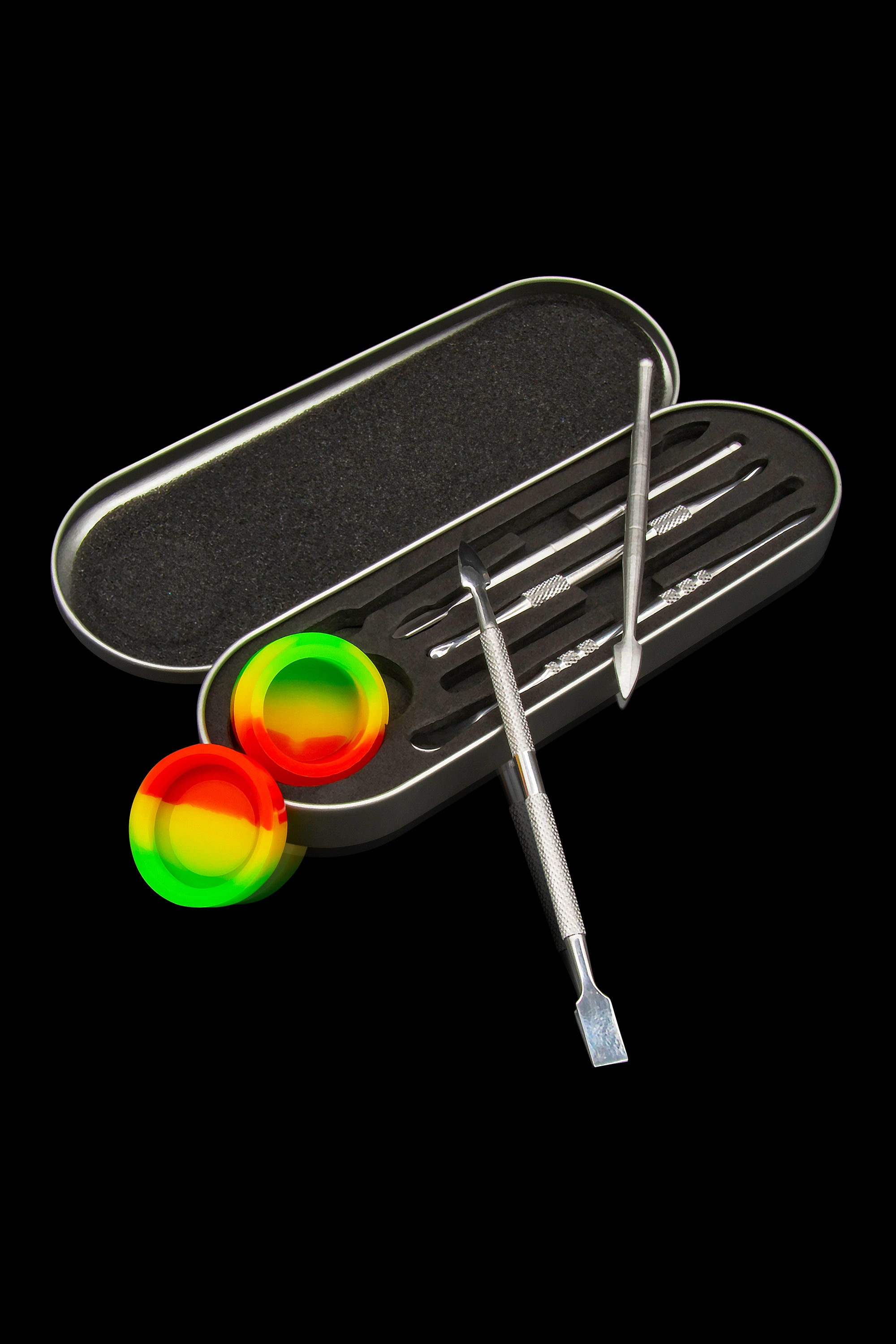 Cannabis accessories including a metal dab tool, silicone containers, and a storage case on a black background.